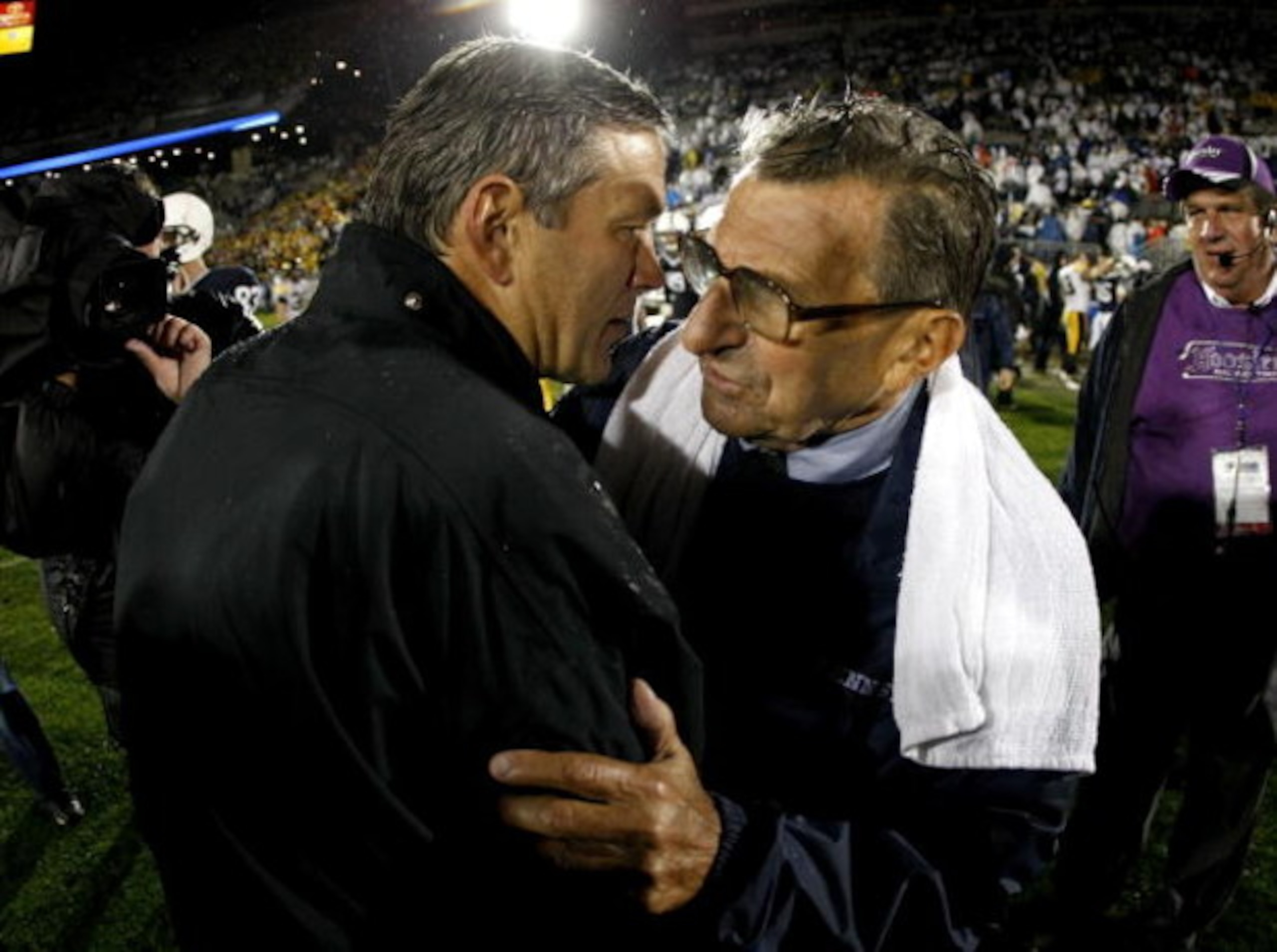 STATE COLLEGE, PA - SEPTEMBER 26: Head coach Kirk Ferentz of the Iowa Hawkeyes shakes hands with head coach Joe Paterno of the Penn State Nittnay Lions after defeating them 21-10 on September 26, 2009 at Beaver Stadium in State College, Pennsylvania. (P STATE COLLEGE, PA - SEPTEMBER 26: Head coach Kirk Ferentz of the Iowa Hawkeyes shakes hands with head coach Joe Paterno of the Penn State Nittnay Lions after defeating them 21-10 on September 26, 2009 at Beaver Stadium in State College, Pennsylvania. (P