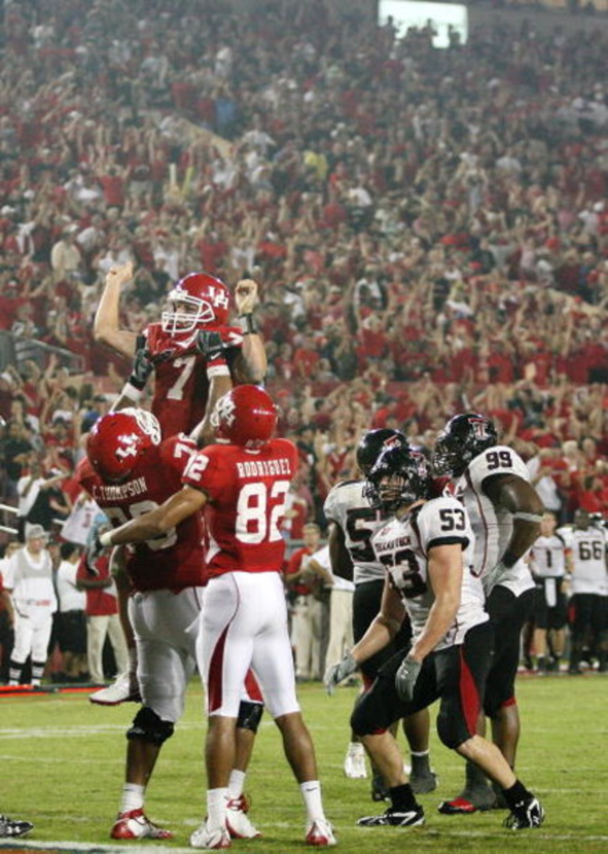 HOUSTON - SEPTEMBER 26: Quarterback Case Keenum #7 of the Houston Cougars is lifted in the air after Kennum scored a 4 yard touchdown run to give the Cougars a 29 to 28 win over the Texas Tech Red Raiders at Robertson Stadium on September 26, 2009 in Hous HOUSTON - SEPTEMBER 26: Quarterback Case Keenum #7 of the Houston Cougars is lifted in the air after Kennum scored a 4 yard touchdown run to give the Cougars a 29 to 28 win over the Texas Tech Red Raiders at Robertson Stadium on September 26, 2009 in Hous