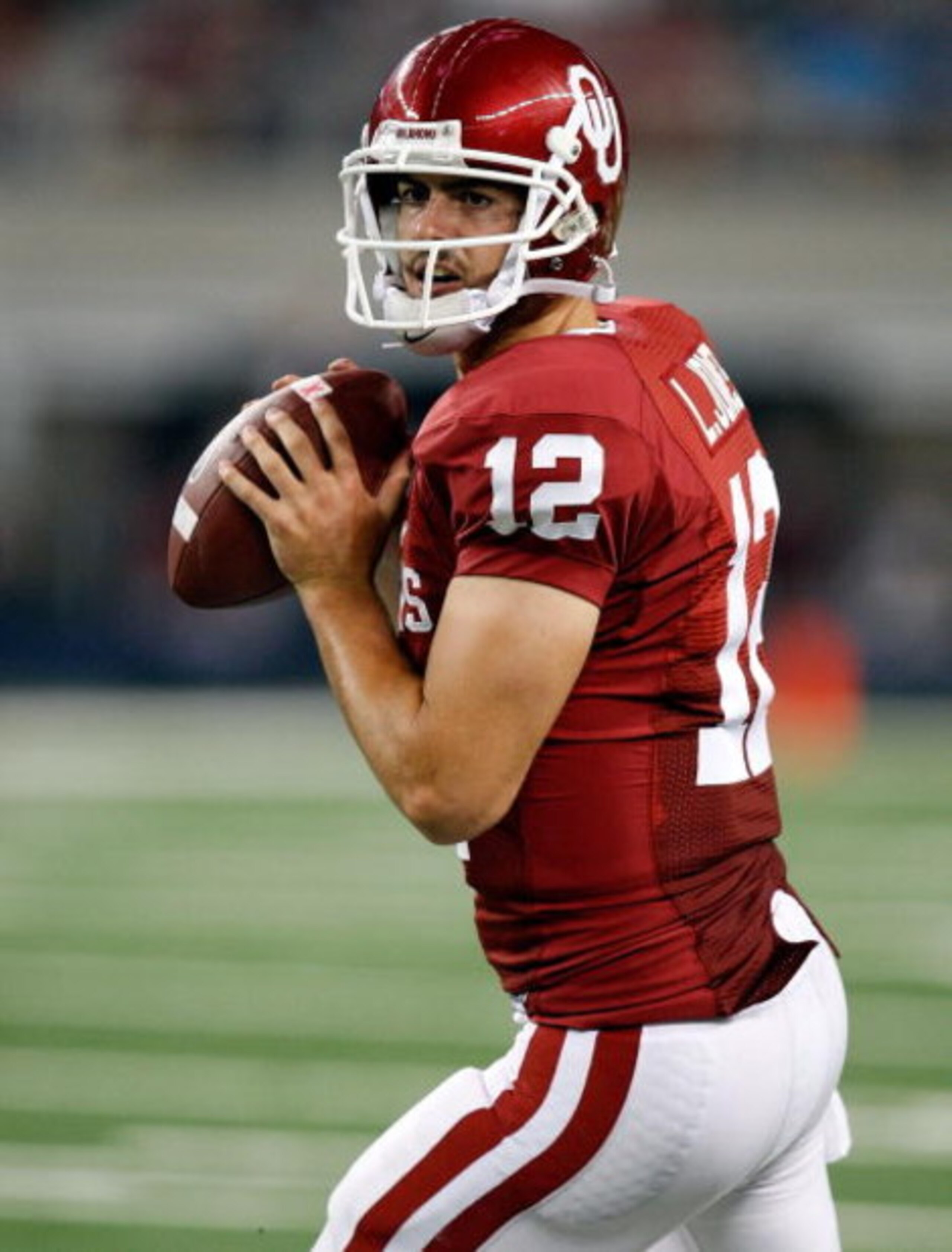 ARLINGTON, TX - SEPTEMBER 05: Quarterback Landry Jones #12 of the Oklahoma Sooners at Cowboys Stadium on September 5, 2009 in Arlington, Texas. (Photo by Ronald Martinez/Getty Images) ARLINGTON, TX - SEPTEMBER 05: Quarterback Landry Jones #12 of the Oklahoma Sooners at Cowboys Stadium on September 5, 2009 in Arlington, Texas. (Photo by Ronald Martinez/Getty Images)