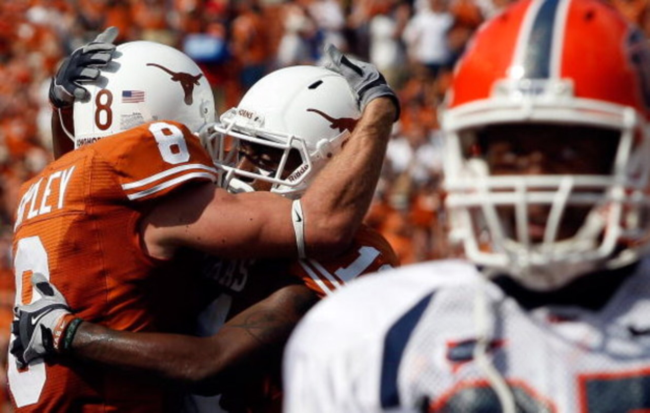 AUSTIN, TX - SEPTEMBER 26: Wide receiver Jordan Shipley #8 and James Kirkendoll #11 of the Texas Longhorns celebrate a touchdown in front of Brandon Miller #25 of the UTEP Miners at Darrell K Royal-Texas Memorial Stadium on September 26, 2009 in Austin, AUSTIN, TX - SEPTEMBER 26: Wide receiver Jordan Shipley #8 and James Kirkendoll #11 of the Texas Longhorns celebrate a touchdown in front of Brandon Miller #25 of the UTEP Miners at Darrell K Royal-Texas Memorial Stadium on September 26, 2009 in Austin,