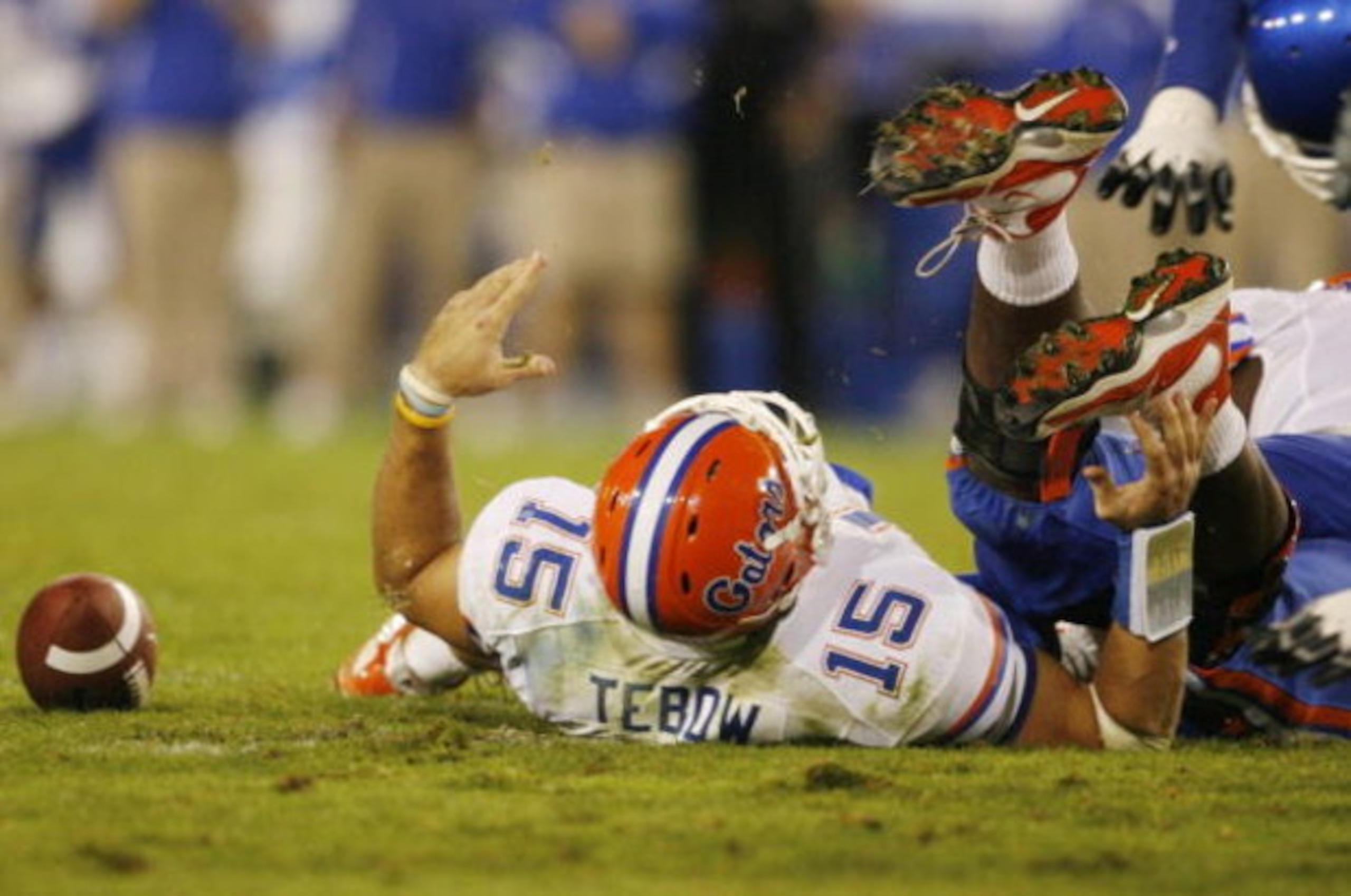 LEXINGTON, KY - SEPTEMBER 26: Quarterback Tim Tebow #15 of the Florida Gators lays on the ground after being sacked by Taylor Wyndham #94 of the Kentucky Wildcats during the third quarter of the game at Commonwealth Stadium on September 26, 2009 in Lexing LEXINGTON, KY - SEPTEMBER 26: Quarterback Tim Tebow #15 of the Florida Gators lays on the ground after being sacked by Taylor Wyndham #94 of the Kentucky Wildcats during the third quarter of the game at Commonwealth Stadium on September 26, 2009 in Lexing
