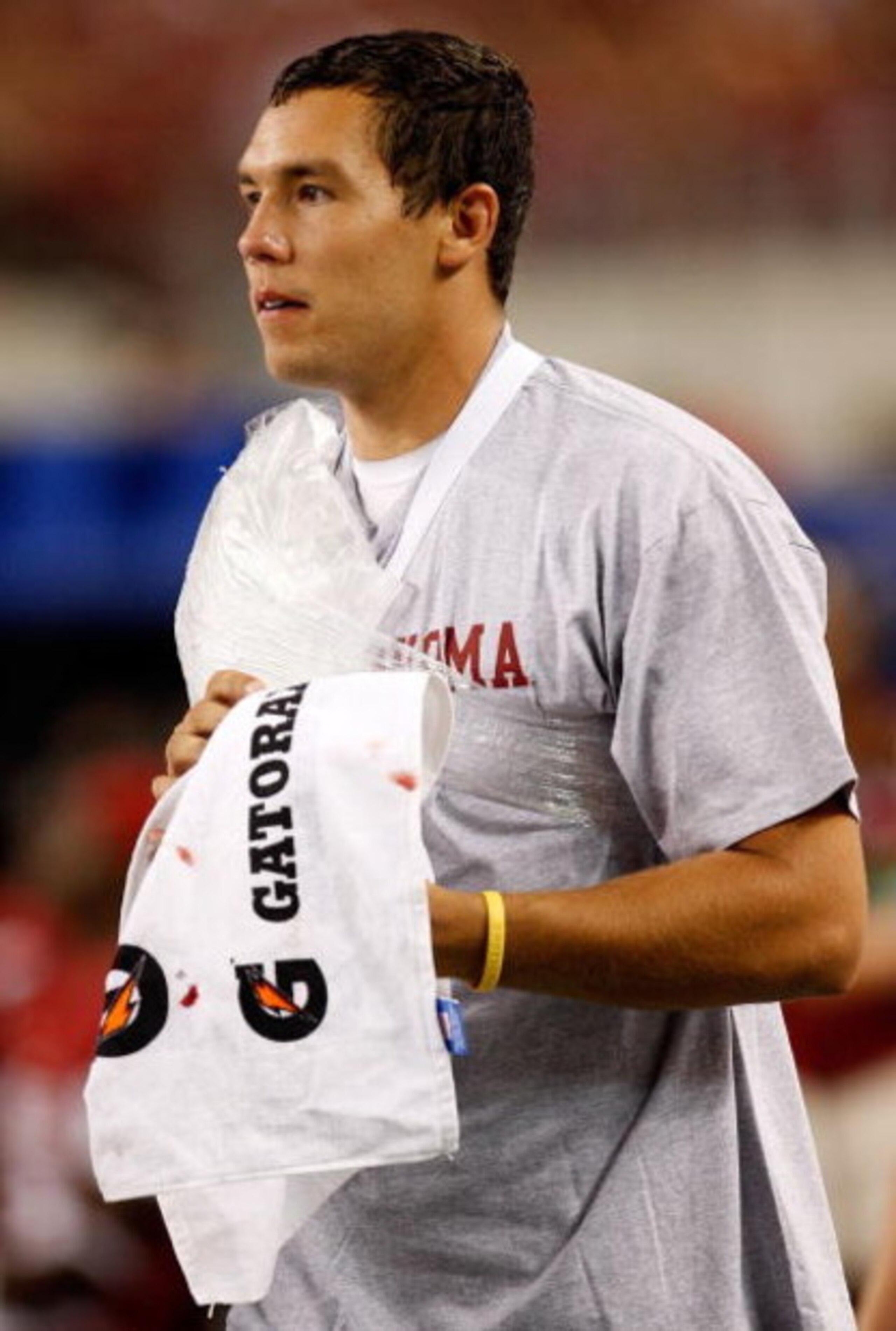 ARLINGTON, TX - SEPTEMBER 05:  Quarterback Sam Bradford #14 of the Oklahoma Sooners on the sidelines after suffering an injury against the Brigham Young Cougars at Cowboys Stadium on September 5, 2009 in Arlington, Texas.  (Photo by Ronald Martinez/Getty 