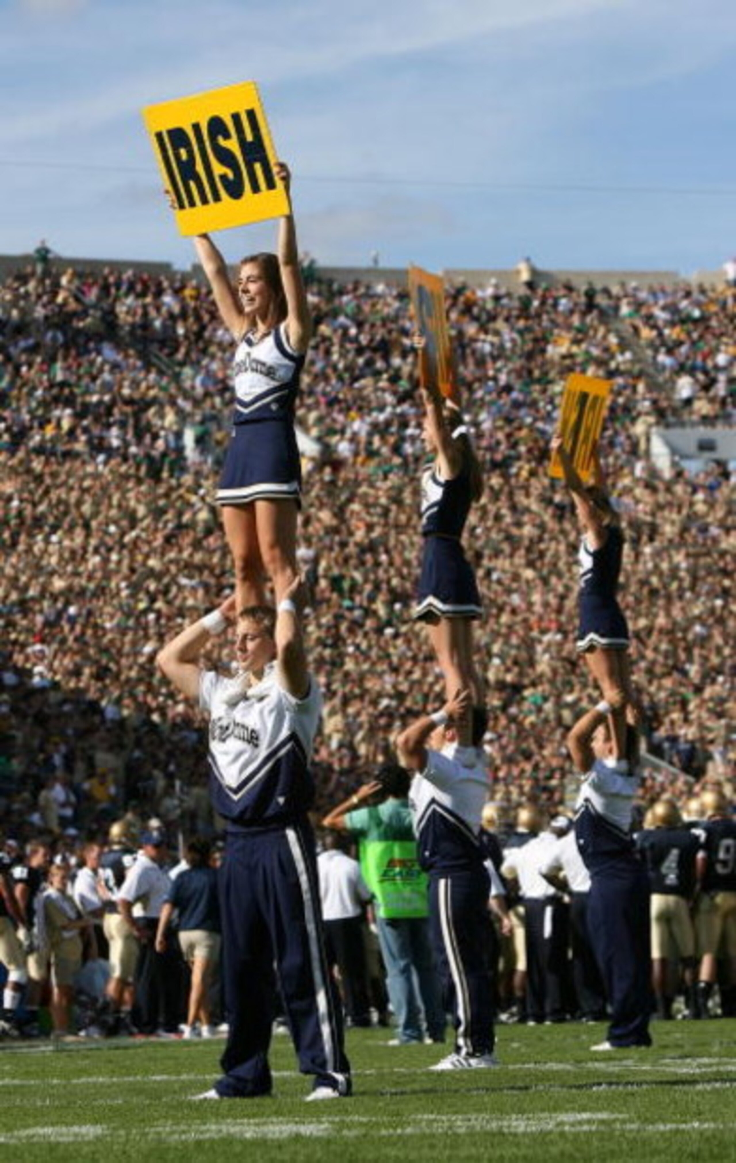 SOUTH BEND, IN - SEPTEMBER 19: Cheerleaders for the Notre Dame Fighting Irish perform during a game against the Michigan State Spartans on September 19, 2009 at Notre Dame Stadium in South Bend, Indiana. Notre Dame defeated Michigan State 33-30. (Photo by
