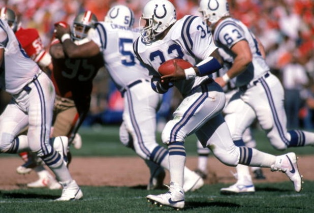 SAN FRANCISCO - OCTOBER 5:  Running back Randy McMillan #32 of the Indianapolis Colts rushes for yards during a game against the San Francisco 49ers at Candlestick Park on October 5, 1986 in San Francisco, California.  The 49ers won 35-14.  (Photo by Geor