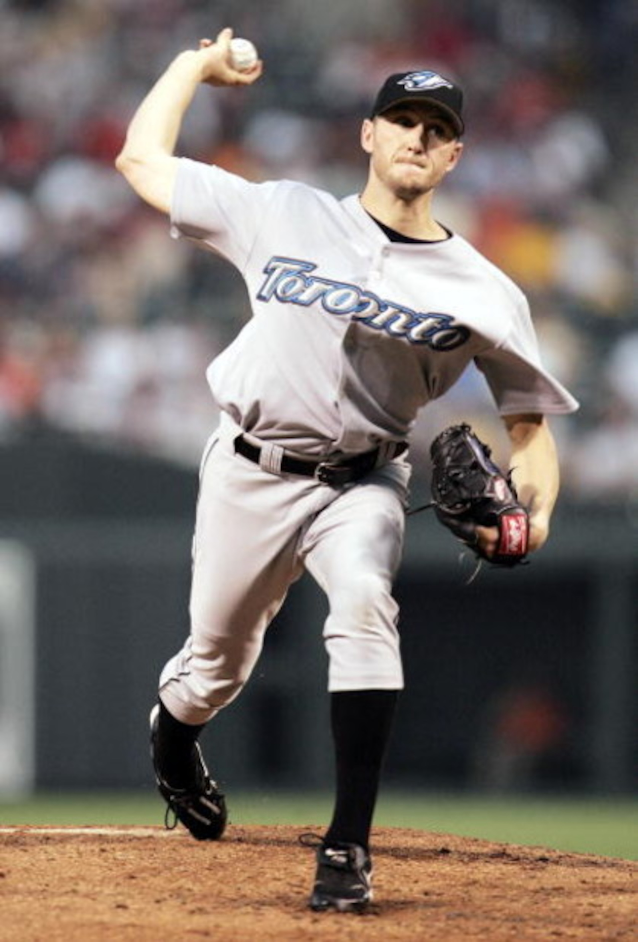 BALTIMORE - AUGUST 12:  Starting pitcher Josh Towers #7 of the Toronto Blue Jays throws against the Baltimore Orioles on August 12, 2005 at Oriole Park at Camden Yards in Baltimore, Maryland.  (Photo by Win McNamee/Getty Images)