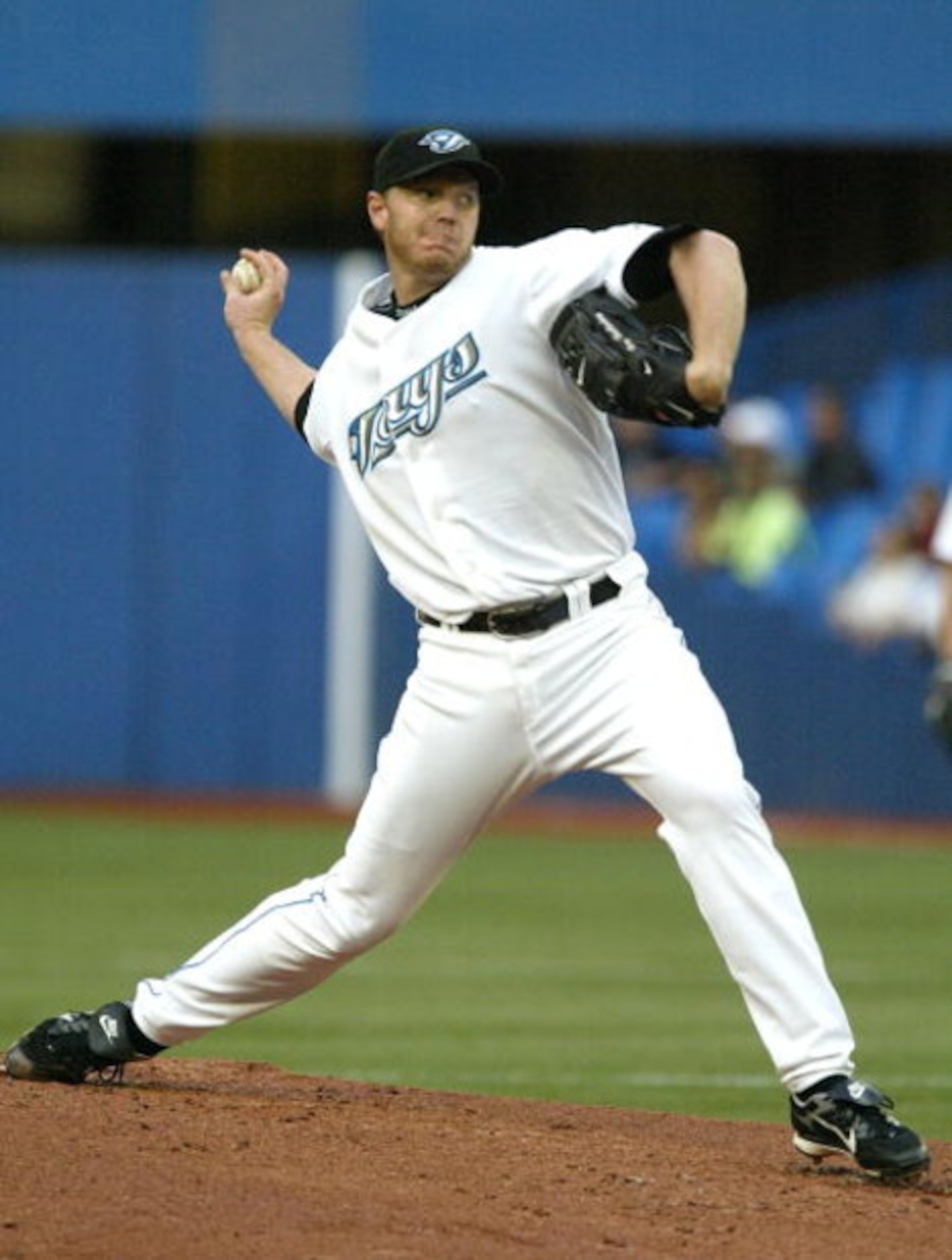 TORONTO - AUGUST 14:  Roy Halladay #32 of the Toronto Blue Jays throws a pitch against the Los Angeles Angels of Anaheim on August 14, 2007 at the Rogers Centre in Toronto, Ontario, Canada.  (Photo by Dave Sandford/Getty Images)