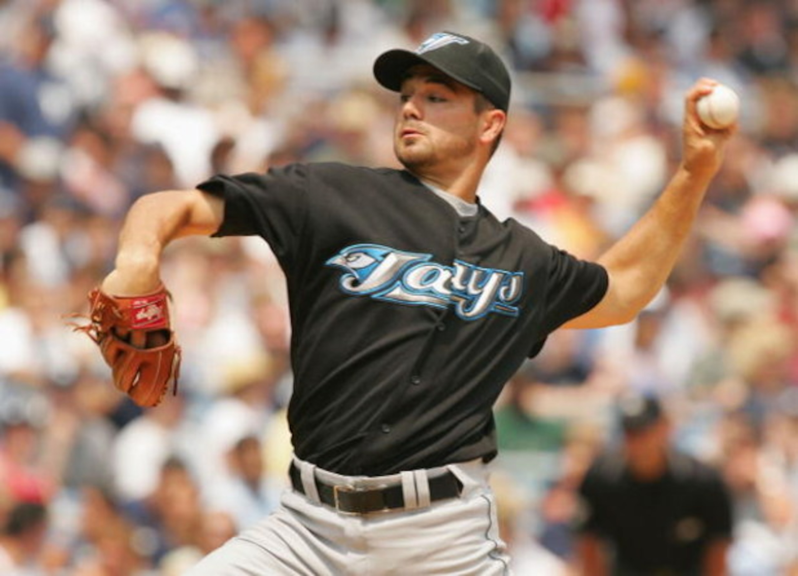 NEW YORK - JULY 22: Ted Lilly of the Toronto Blue Jays pitches against the New York Yankees during their game on July 22, 2004 at Yankee Stadium in the Bronx borough of New York City.  (Photo by Al Bello/Getty Images)