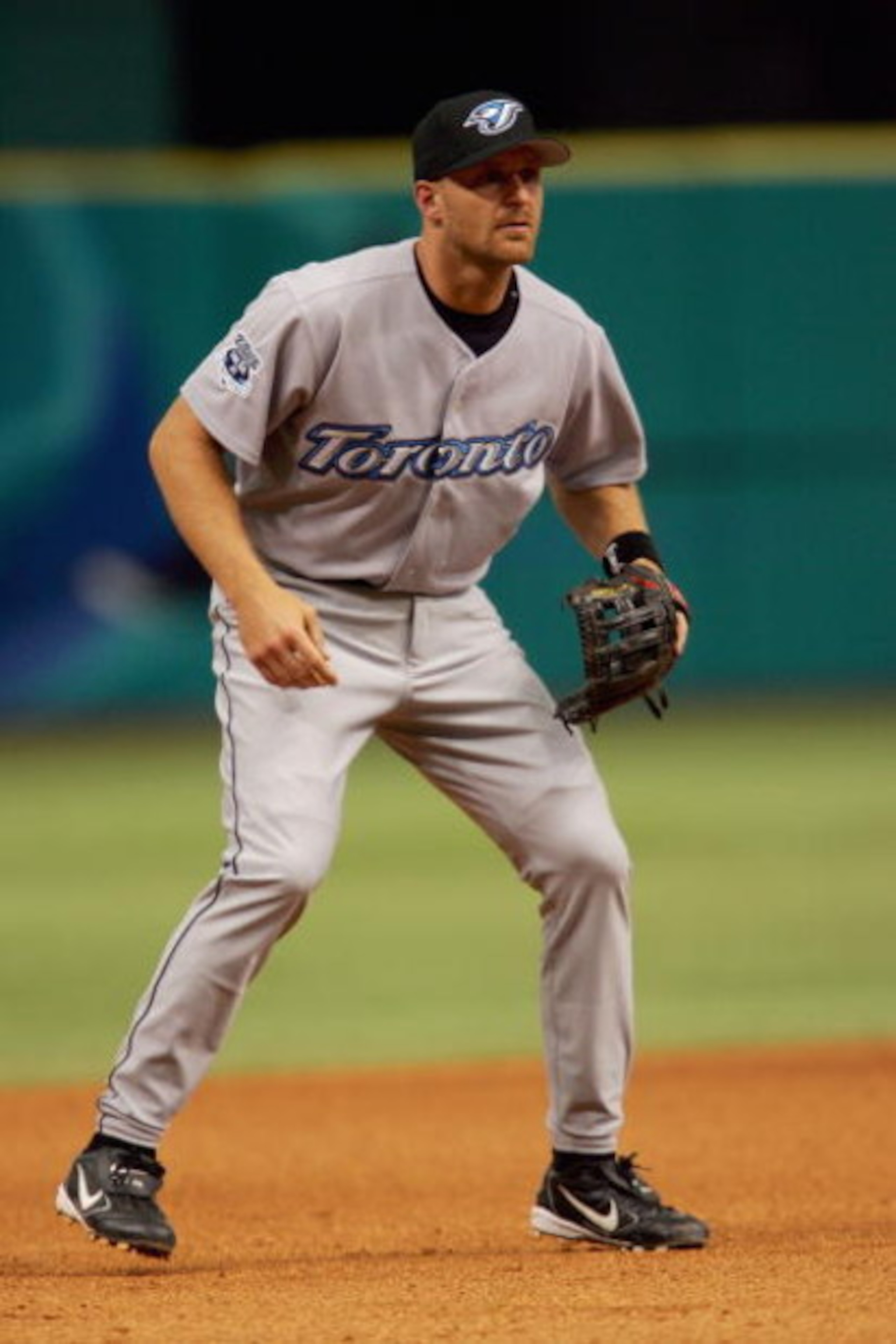 ST. PETERSBURG, FL - APRIL 4:  Corey Koskie #47 of the Toronto Blue Jays stands on the field during the game with the Tampa Bay Devil Rays at the Tropicana Field home opener at on April 4, 2005 St. Petersburg, Florida. (Photo by Nick Laham/Getty Images).