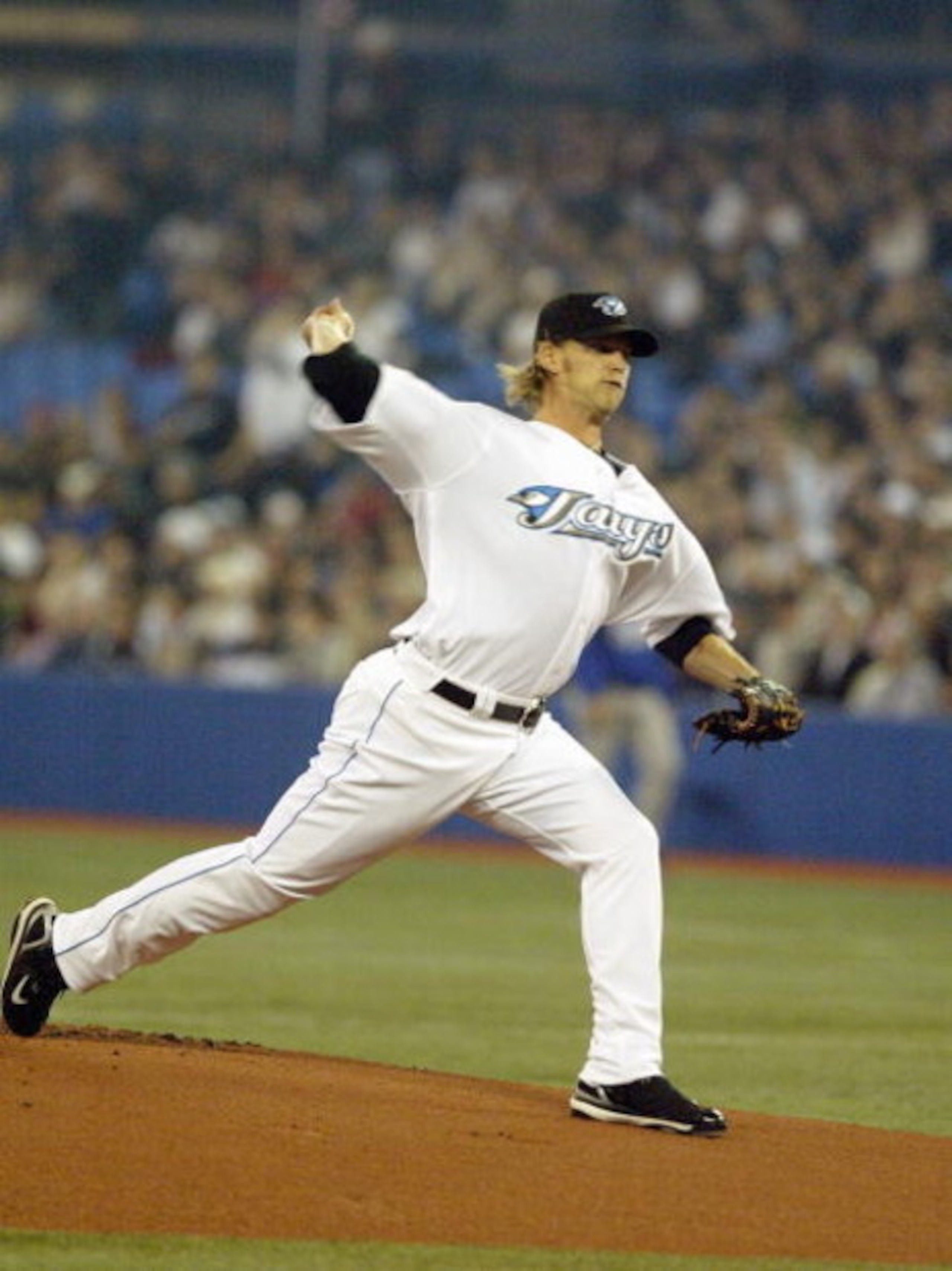 TORONTO - APRIL 9: A.J. Burnett #34 of the Toronto Blue Jays delivers the pitch against the Kansas City Royals during the MLB game on the opening day at the Rogers Centre April 9, 2007 in Toronto, Canada. (Photo By Dave Sandford/Getty Images)