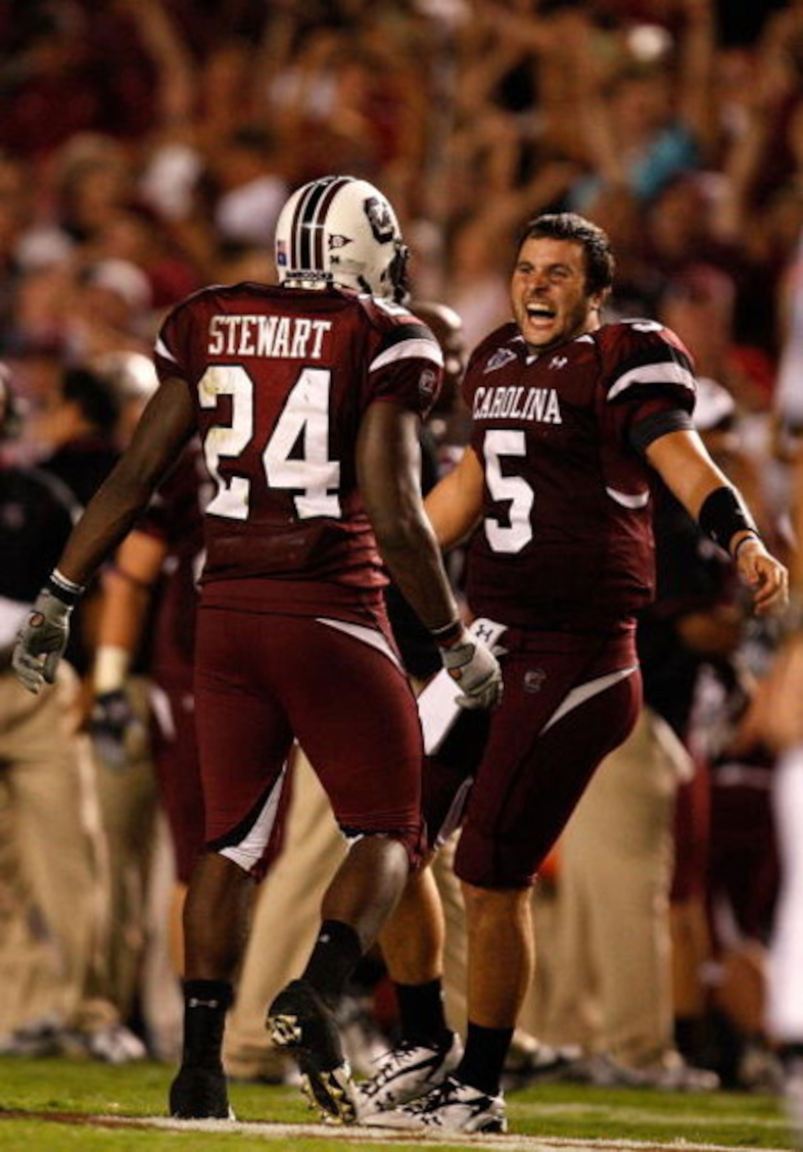 COLUMBIA, SC - SEPTEMBER 24:  Stephen Garcia #5 of the South Carolina Gamecocks celebrates with teammate Darian Stewart #24 after a 16-10 vicotry over the Ole Miss Rebels during their game at Williams-Brice Stadium on September 24, 2009 in Columbia, South