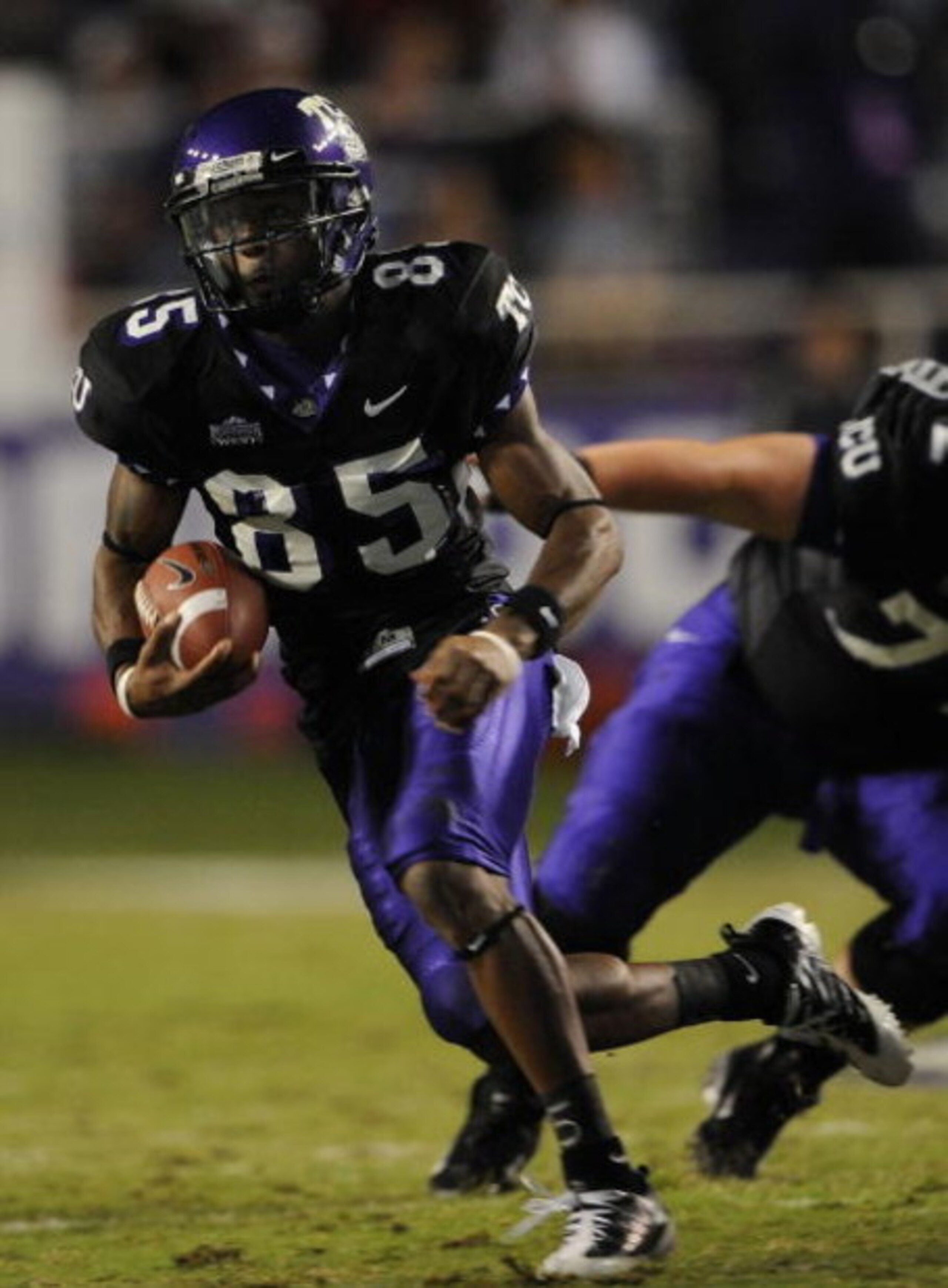 FORT WORTH, TX - OCTOBER 16:  Wide receiver Jeremy Kerley #85 of the TCU Horned Frogs runs for a touchdown in the first quarter at Amon G. Carter Stadium on October 16, 2008 in Fort Worth, Texas.  (Photo by Ronald Martinez/Getty Images)