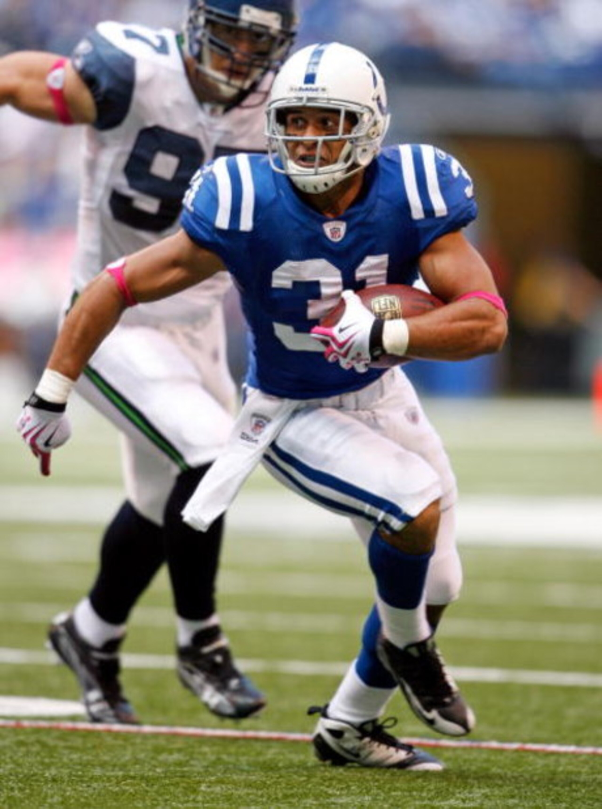 INDIANAPOLIS - OCTOBER 04:  Donald Brown #31 of the Indianapolis Colts runs with the ball during the NFL game against the Seattle Seahawks at Lucas Oil Stadium on October 4, 2009 in Indianapolis, Indiana. The Colts won 34-17.  (Photo by Andy Lyons/Getty I