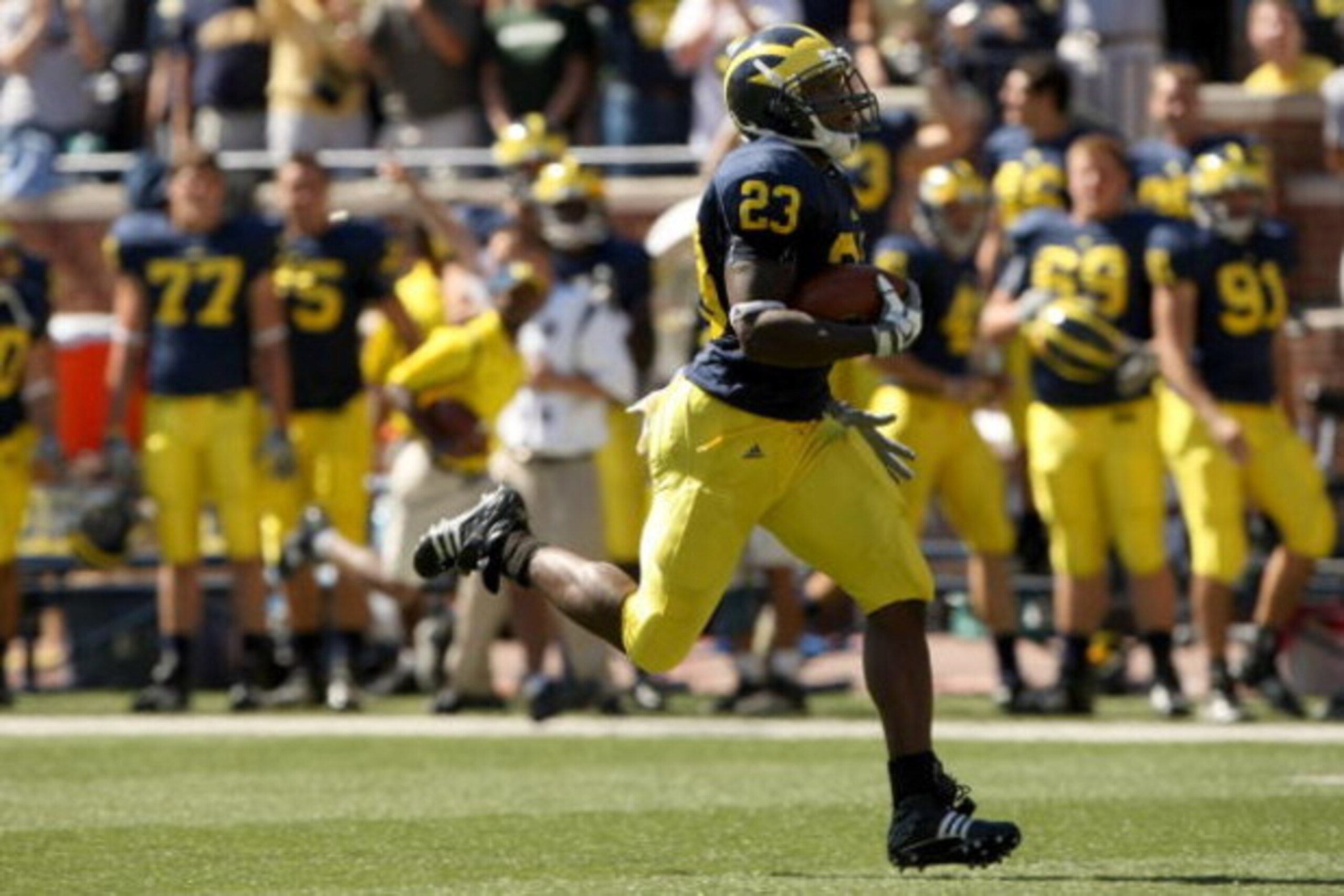 ANN ARBOR, MI - SEPTEMBER 19: Running back Carlos Brown #23 of the Michigan Wolverines breaks away on a 90 yard touchdown run against the Eastern Michigan Eagles at Michigan Stadium on September 19, 2009 in Ann Arbor, Michigan. (Photo by Stephen Dunn/G ANN ARBOR, MI - SEPTEMBER 19: Running back Carlos Brown #23 of the Michigan Wolverines breaks away on a 90 yard touchdown run against the Eastern Michigan Eagles at Michigan Stadium on September 19, 2009 in Ann Arbor, Michigan. (Photo by Stephen Dunn/G
