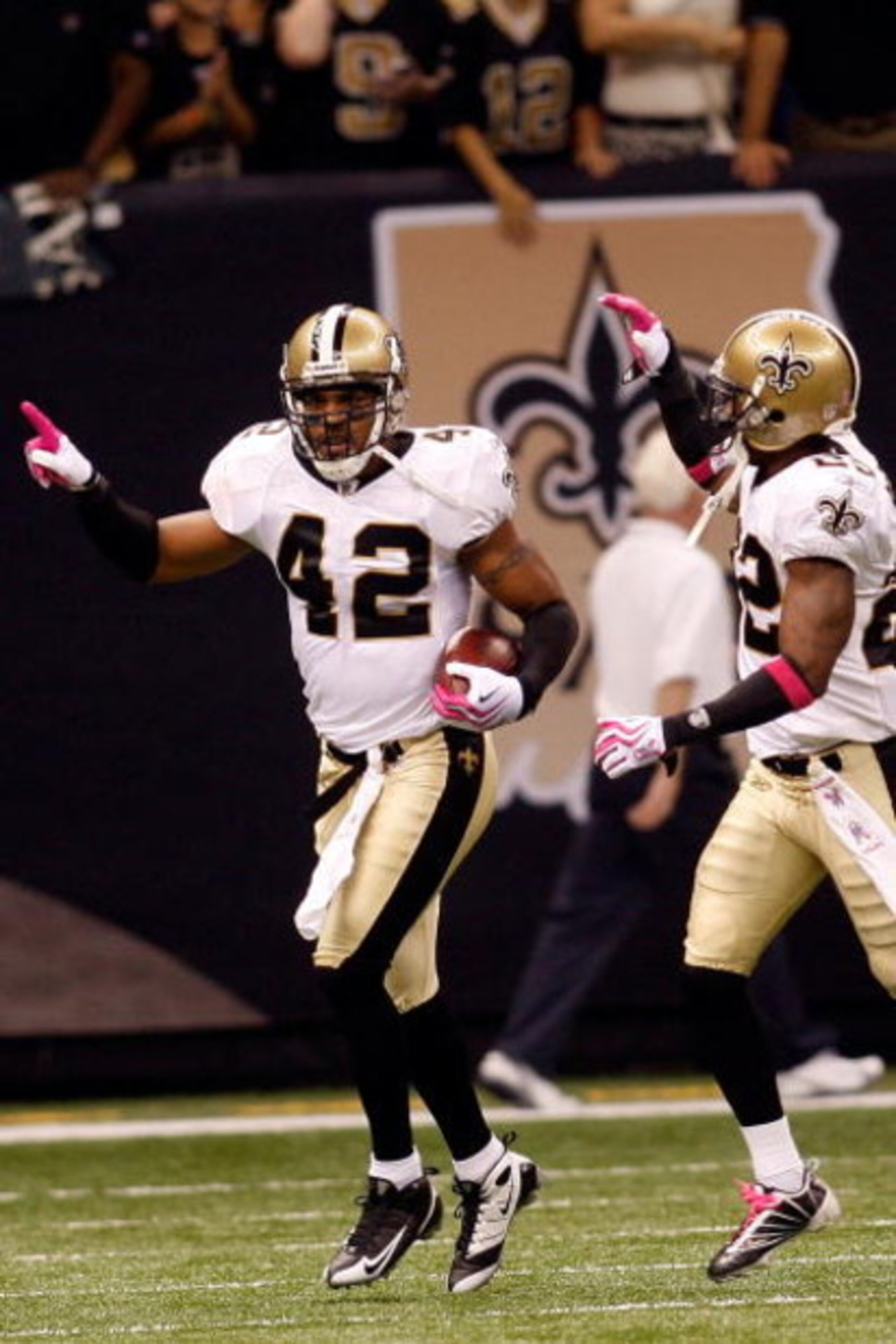 NEW ORLEANS - OCTOBER 04:  Darren Sharper #42 of the New Orleans Saints celebrates after scoring a touchdown on an interception against the New York Jets at the Louisana Superdome on October 4, 2009 in New Orleans, Louisiana.  (Photo by Chris Graythen/Get