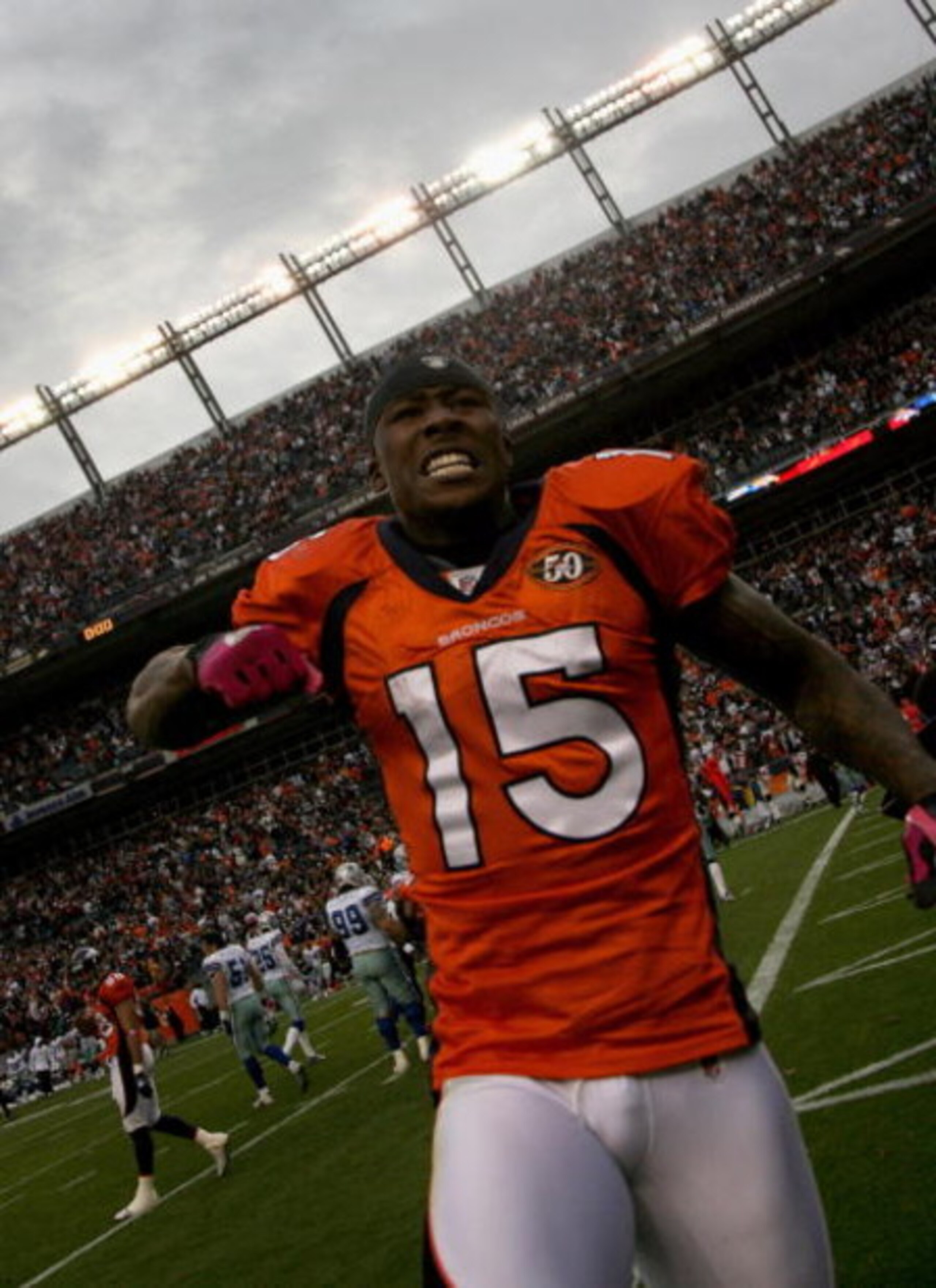 DENVER - OCTOBER 04:  Brandon Marshall #15 of the Denver Broncos celebrates after the final play against the Dallas Cowboys during NFL action at Invesco Field at Mile High on October 4, 2009 in Denver, Colorado. Marshall caught a game winning 51 yard rece