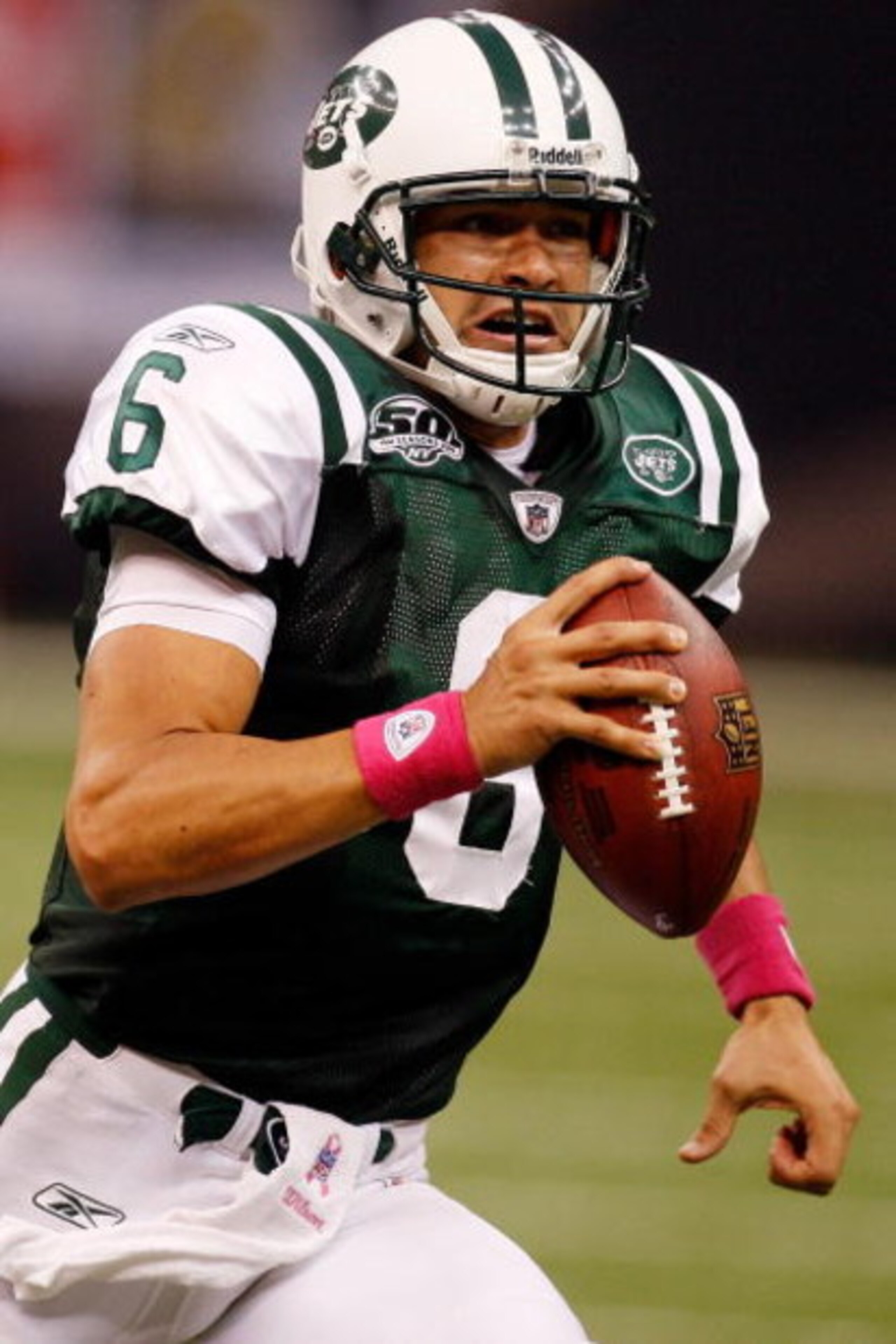 NEW ORLEANS - OCTOBER 04:  Quarterback Mark Sanchez #6 of the New York Jets scrambles against the New Orleans Saints at the Louisana Superdome on October 4, 2009 in New Orleans, Louisiana.  (Photo by Chris Graythen/Getty Images)