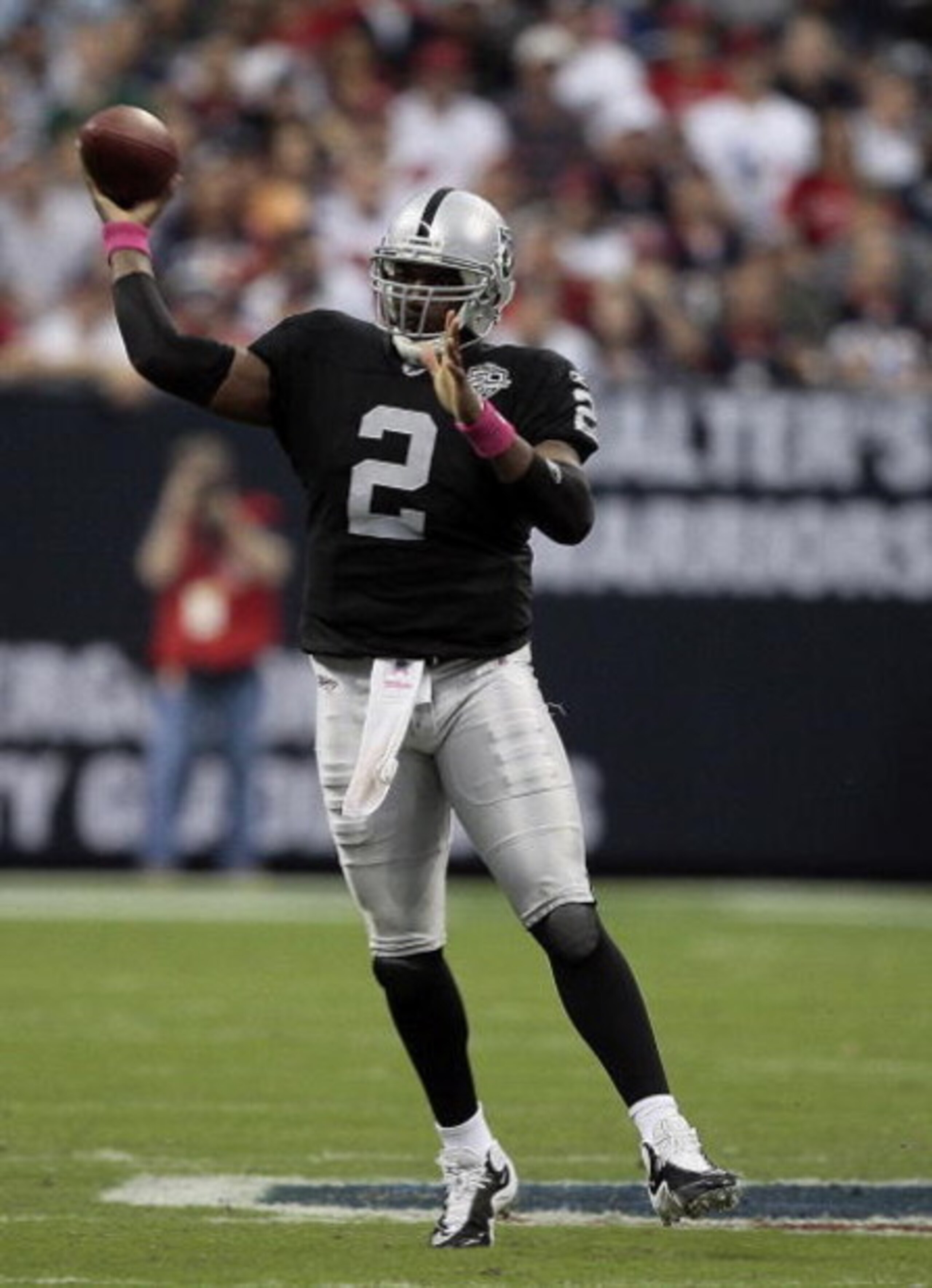 HOUSTON - OCTOBER 04:  Quarterback JeMarcus Russell #2 of the Oakland Raiders throws a pass against the Houston Texans at Reliant Stadium on October 4, 2009 in Houston, Texas.  (Photo by Bob Levey/Getty Images)