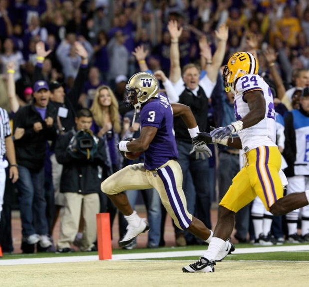 SEATTLE - SEPTEMBER 05:  Wide receiver James Johnson #3 of the Washington Huskies scores a touchdown past Harry Coleman #24 of the LSU Tigers on September 5, 2009 at Husky Stadium in Seattle, Washington. (Photo by Otto Greule Jr/Getty Images)