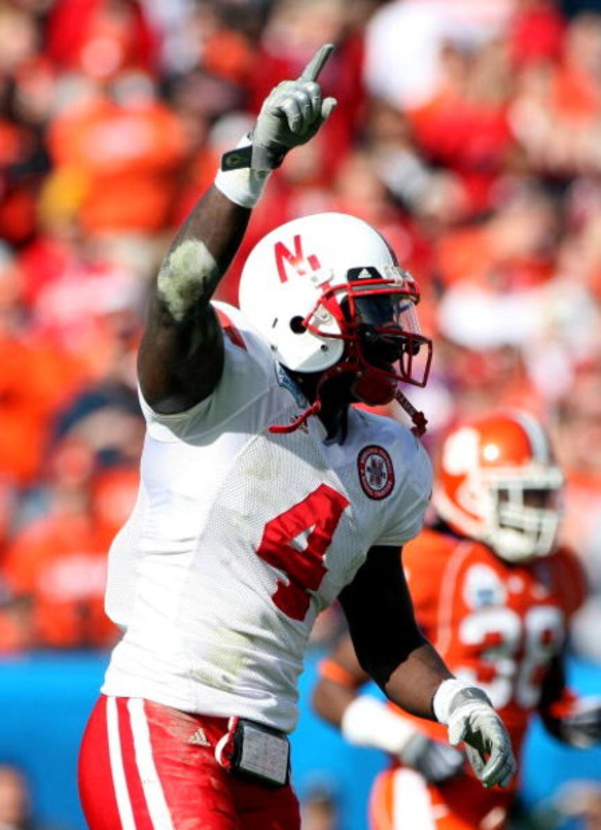 JACKSONVILLE, FL - JANUARY 1:  Larry Asante #4 of the Nebraska Cornhuskers celebrates a recovered turnover during the Konica Minolta Gator Bowl against the Clemson Tigers at Jacksonville Municipal Stadium January 1, 2009 in Jacksonville, Florida.  (Photo 