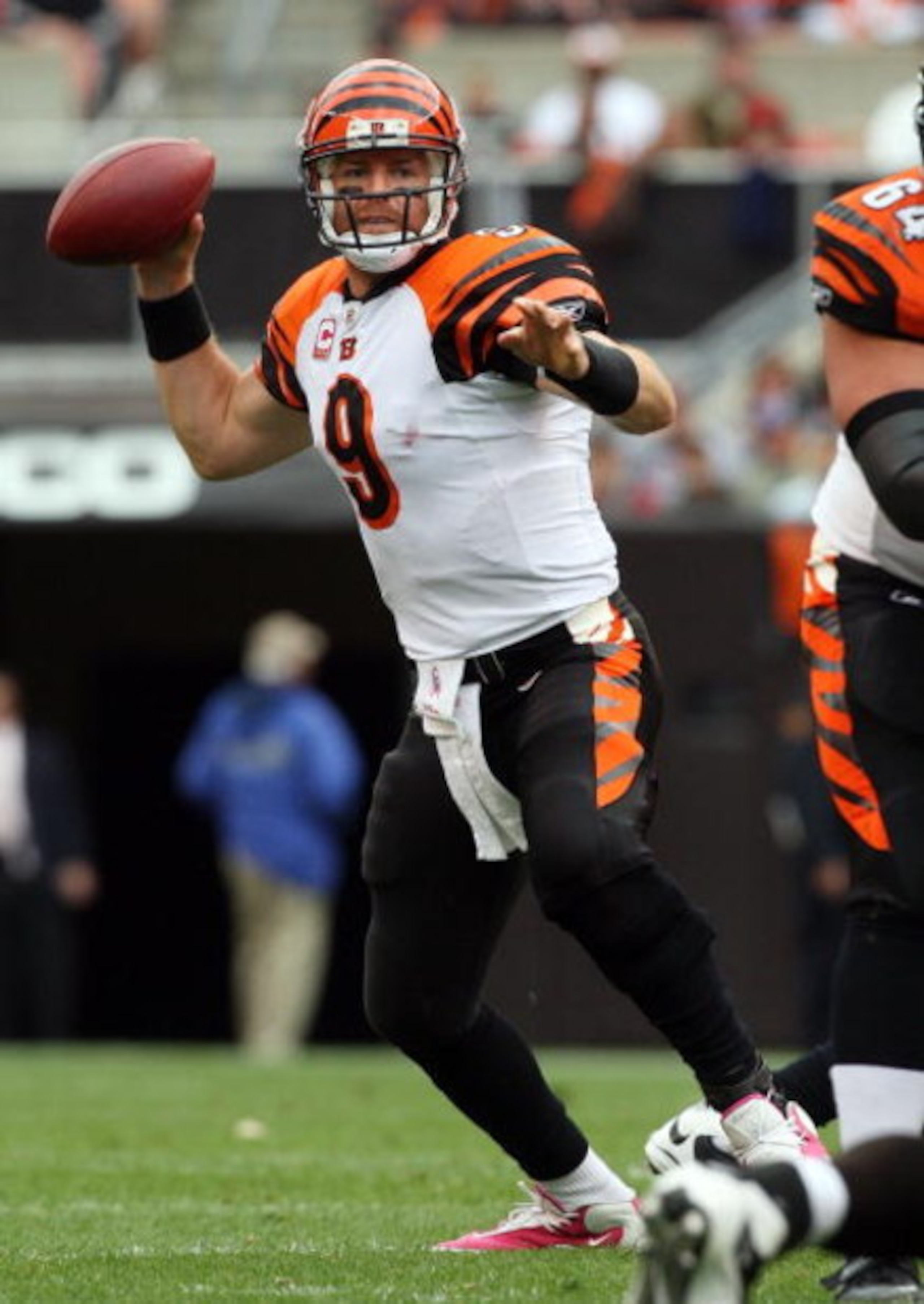 CLEVELAND - OCTOBER 04:  Carson Palmer #9 of the Cincinnati Bengals throws a pass against the Cleveland Browns during their game at Cleveland Browns Stadium on October 4, 2009 in Cleveland, Ohio. The Bengals defeated the Browns 23-20 in overtime.  (Photo 