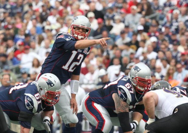 FOXBORO, MA - OCTOBER 4:  Tom Brady #12 of the New England Patriots gestures during a game against the Baltimore Ravens at Gillette Stadium on October 4, 2009 in Foxboro, Massachusetts. (Photo by Jim Rogash/Getty Images)