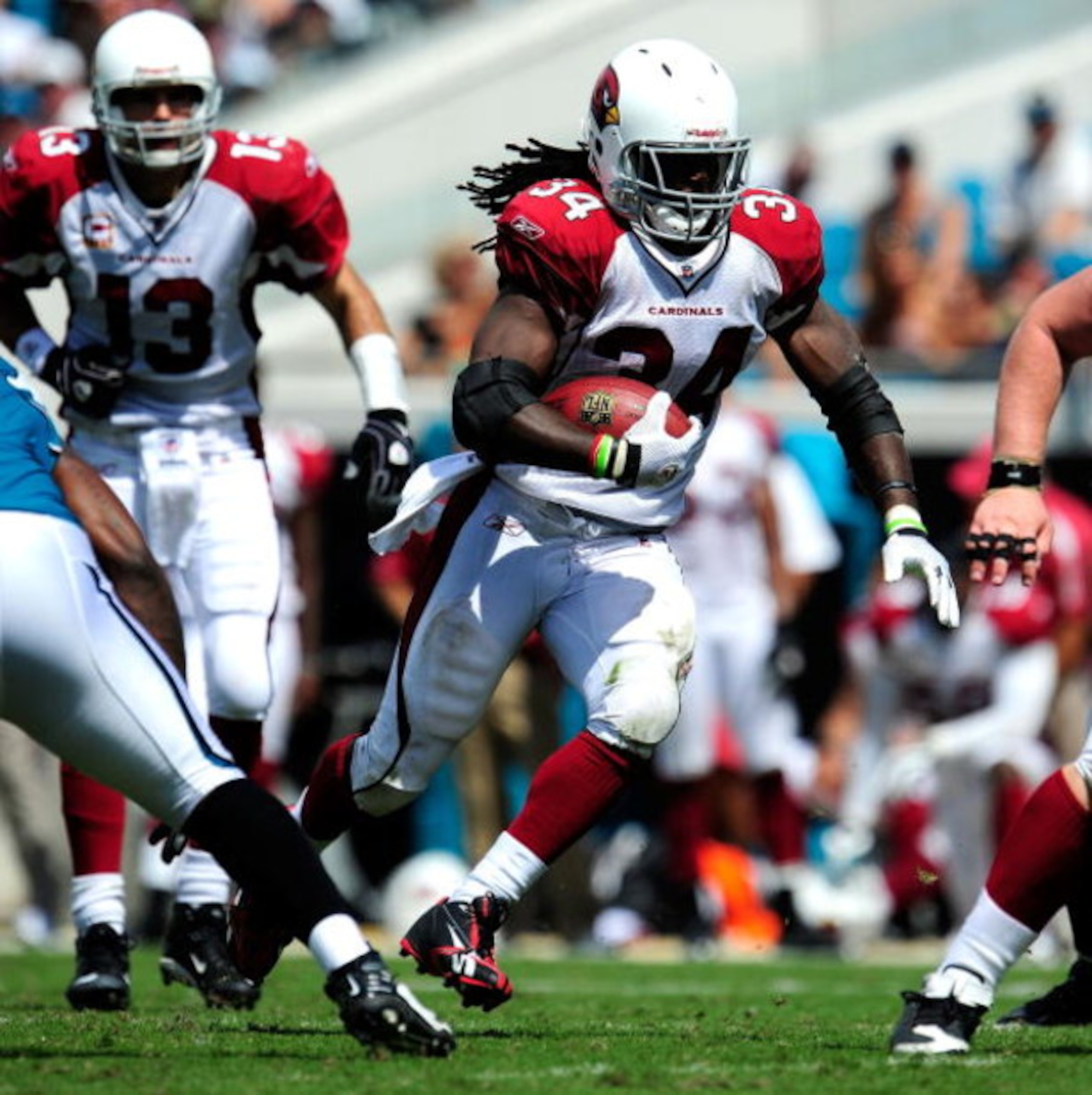 JACKSONVILLE, FL - SEPTEMBER 20:  Tim Hightower #34 of the Arizona Cardinals runs during the game against the Jacksonville Jaguars at Jacksonville Municipal Stadium on September 20, 2009 in Jacksonville, Florida.  (Photo by Sam Greenwood/Getty Images)