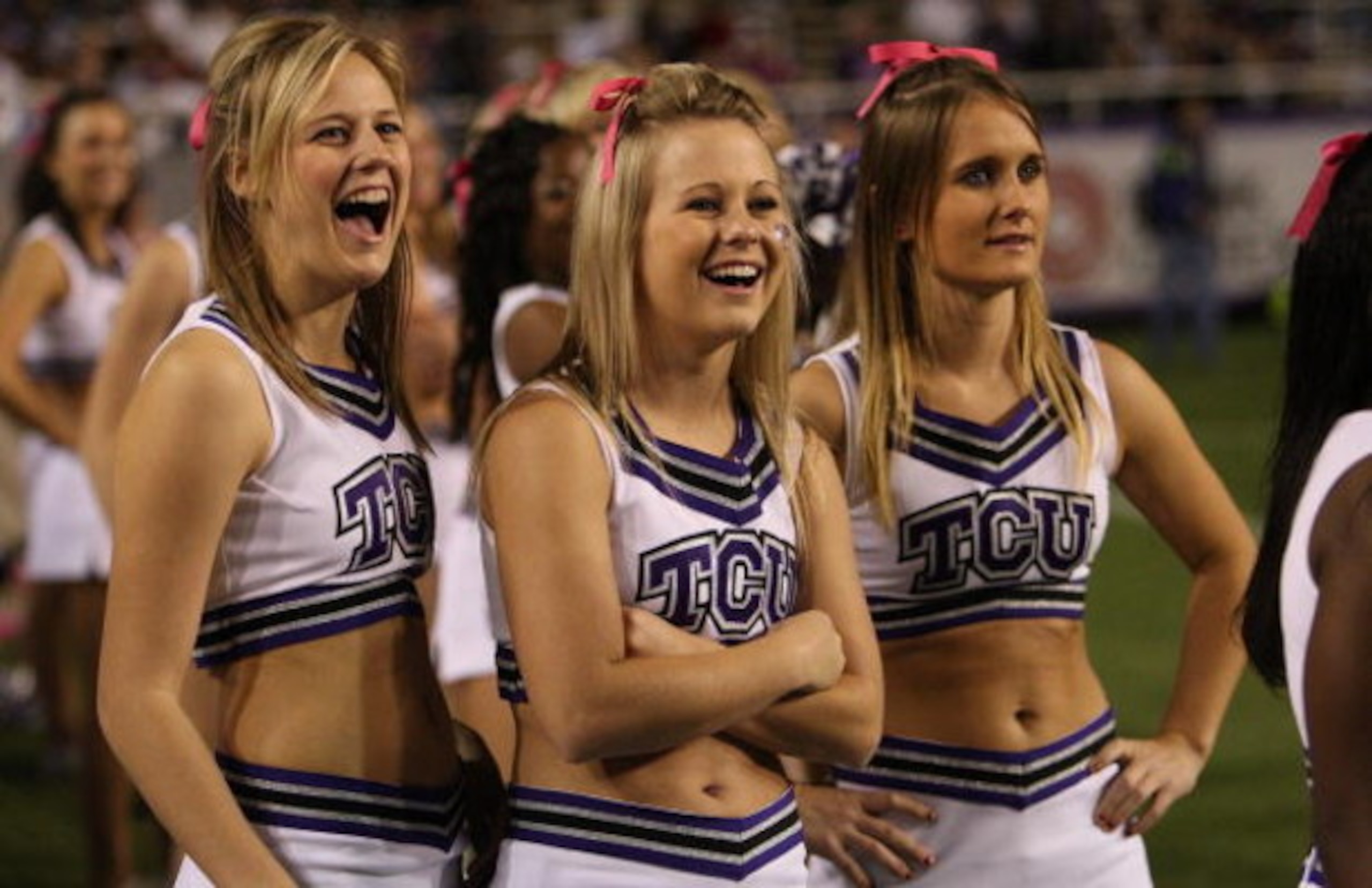 FORT WORTH, TX - OCTOBER 16: TCU Horned Frogs cheerleaders wear pink ribbons for Breast Cancer Awareness month during play against the BYU Cougars at Amon G. Carter Stadium on October 16, 2008 in Fort Worth, Texas. (Photo by Ronald Martinez/Getty Images FORT WORTH, TX - OCTOBER 16: TCU Horned Frogs cheerleaders wear pink ribbons for Breast Cancer Awareness month during play against the BYU Cougars at Amon G. Carter Stadium on October 16, 2008 in Fort Worth, Texas. (Photo by Ronald Martinez/Getty Images