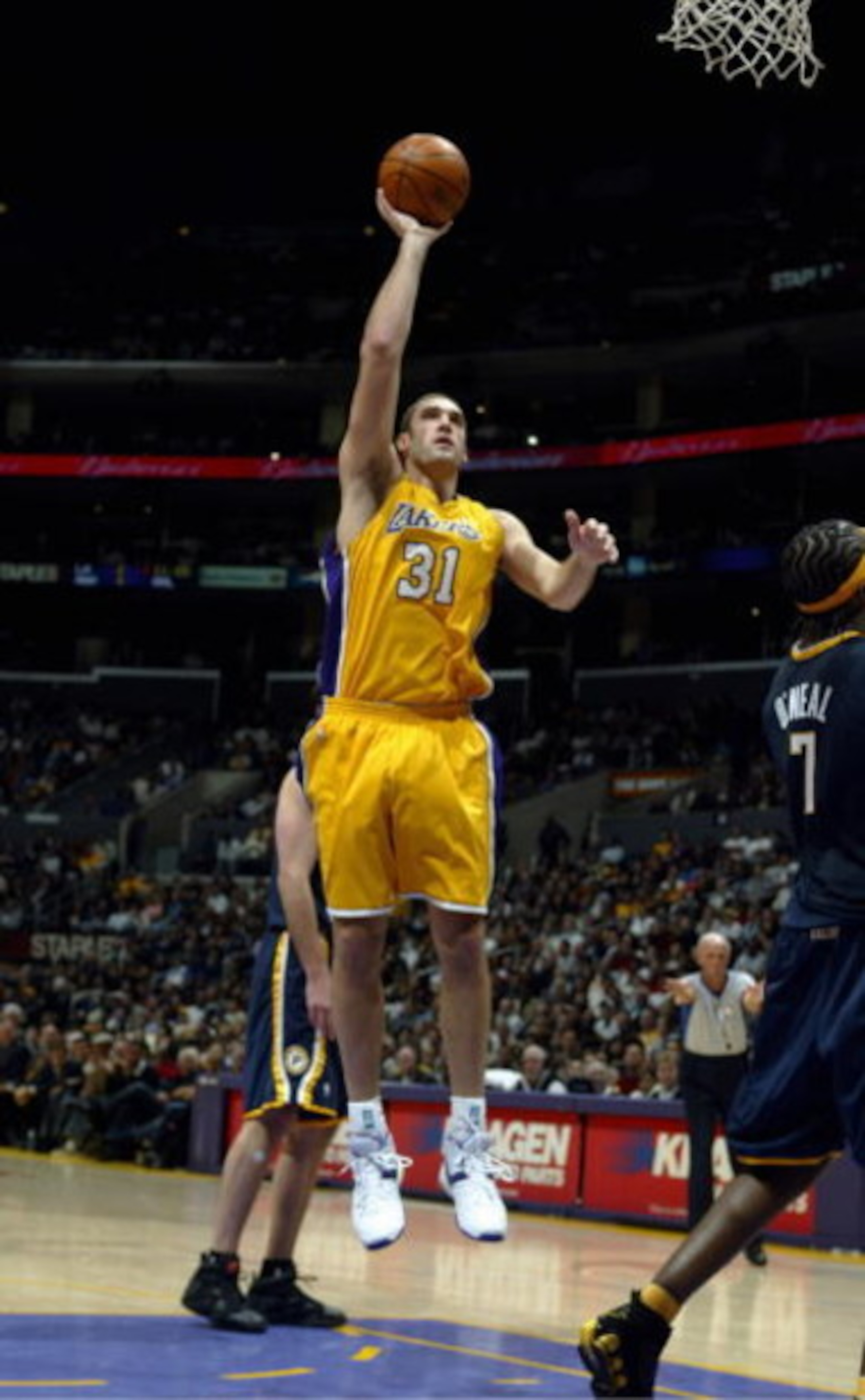 LOS ANGELES - JANUARY 9:  Chris Mihm #31 of the Los Angeles Lakers shoots a layup during the game with the Indiana Pacers at Staples Center on January 9, 2006 in Los Angeles, California. The Lakers won 96-90. NOTE TO USER: User expressly acknowledges and 