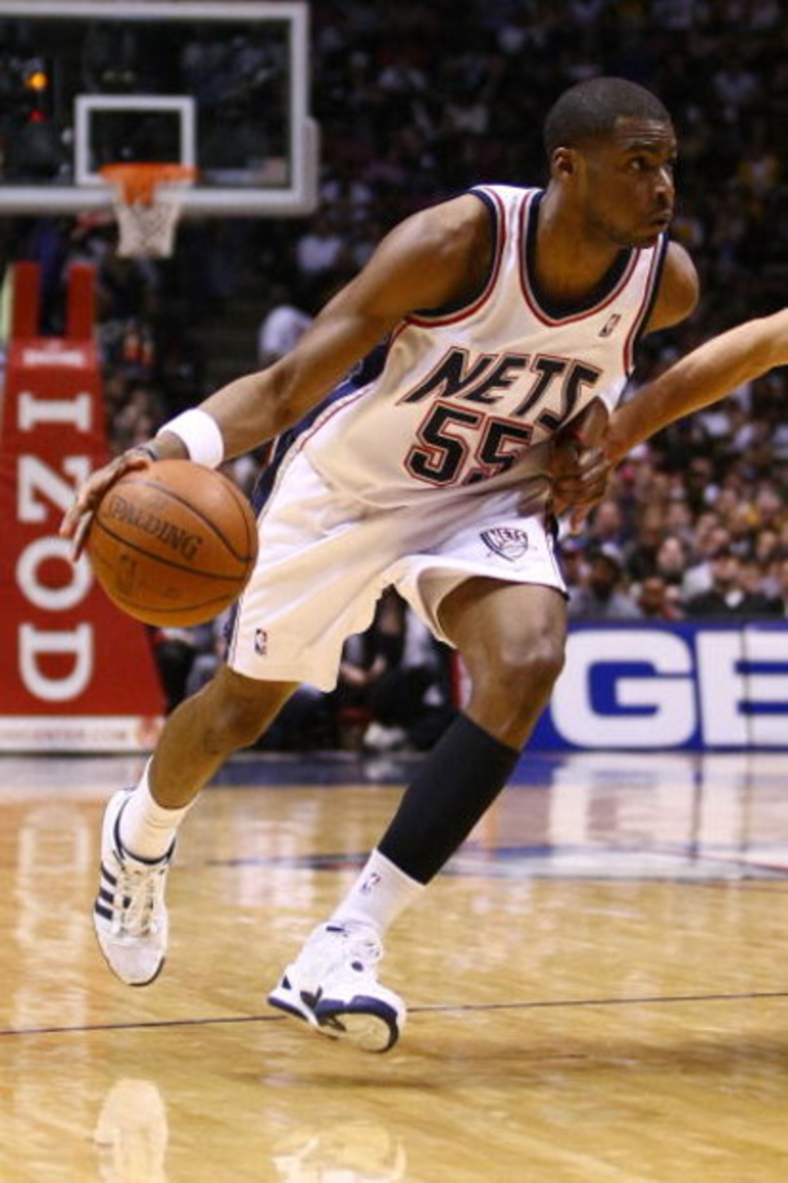 EAST RUTHERFORD, NJ - MARCH 27: Keyon Dooling #55 of the New Jersey Nets drives against the Los Angeles Lakers during the game on March 27, 2009 at the Izod Center in East Rutherford, New Jersey. NOTE TO USER: User expressly acknowledges and agrees that, 