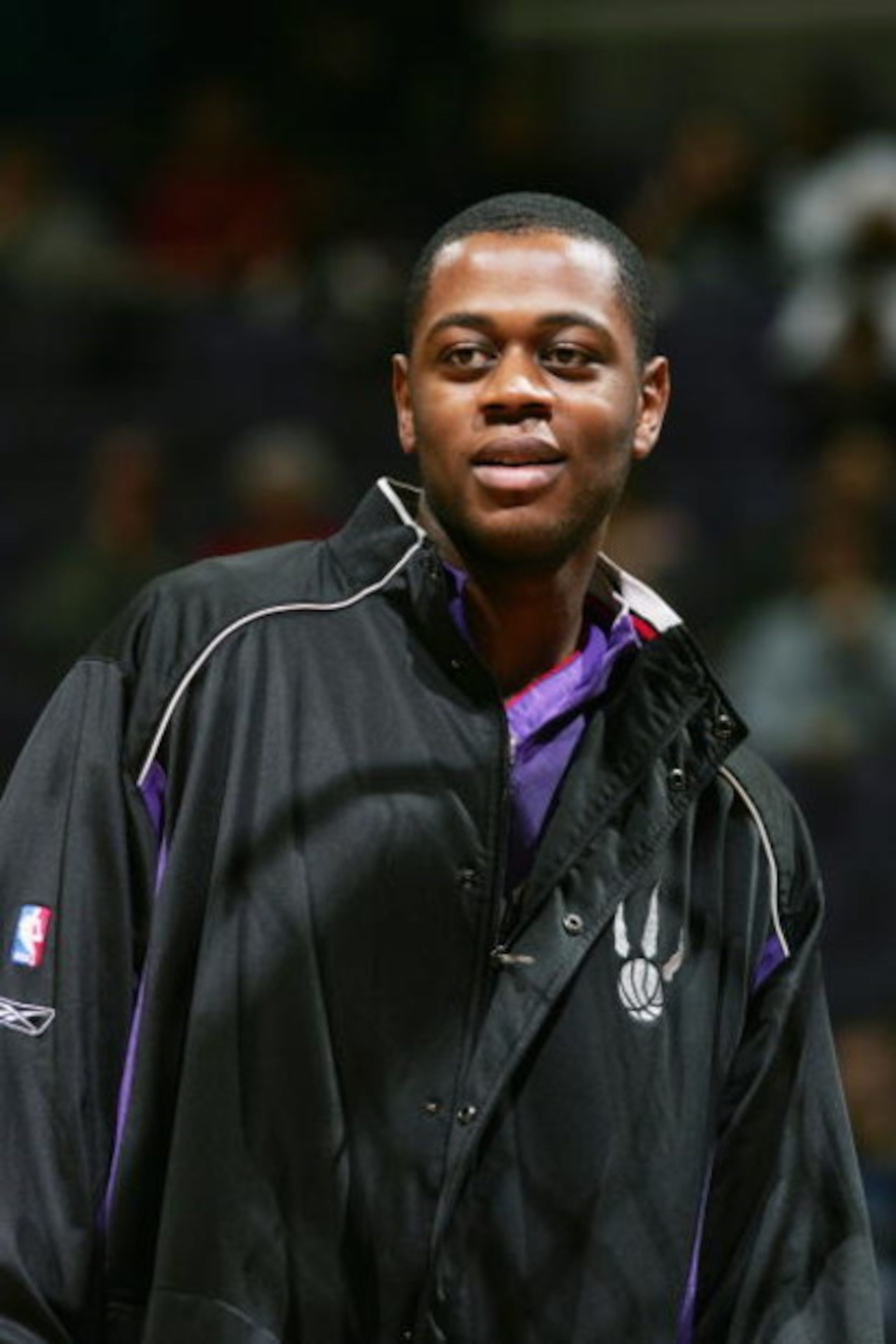 WASHINGTON DC - NOVEMBER 23:  Jerome Moiso #6 of the Toronto Raptors looks on before playing against the Washington Wizards during NBA action on November 23, 2004 at the MCI Center in Washington D.C.  The Wizards won 102-86. NOTE TO USER:  User expressly 