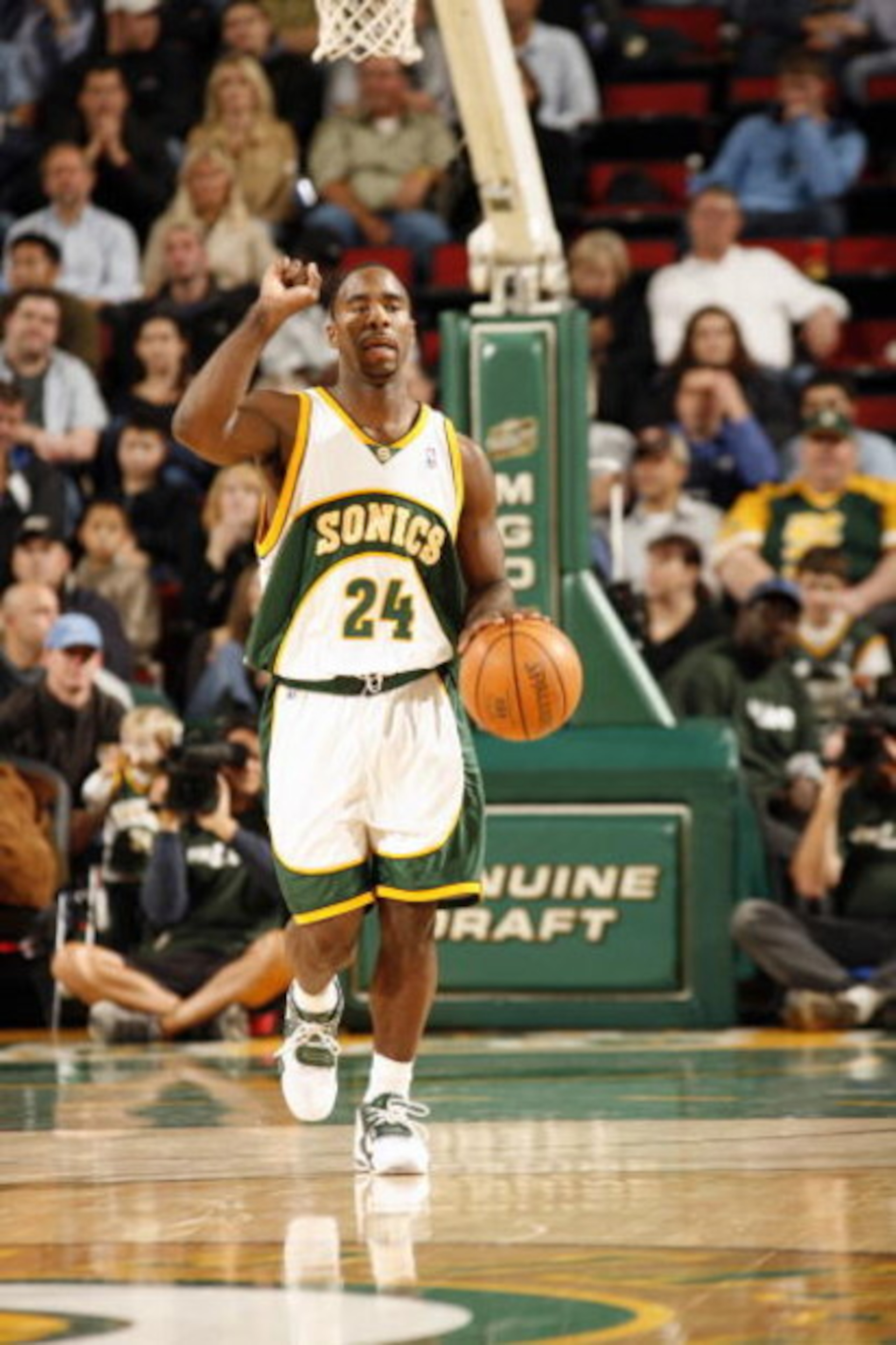 SEATTLE - NOVEMBER 18:  Mateen Cleaves #24 of the Seattle Sonics calls a play a he moves the ball up court during a game against the Chicago Bulls at the KeyArena on November 18, 2005 in Seattle, Washington. The Sonics won 98-84.  NOTE TO USER: User expre