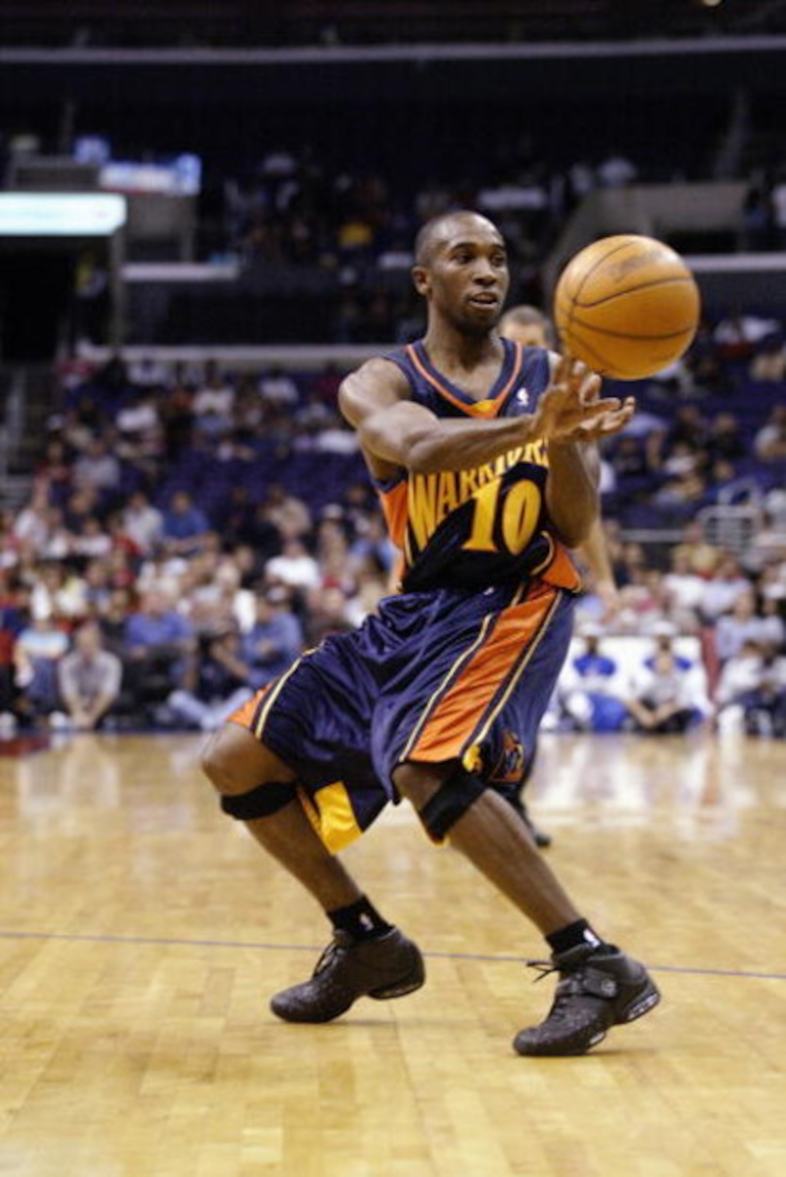 LOS ANGELES - OCTOBER 24:  Speedy Claxton #10 of the Golden State Warriors passes during the preseason game against the Los Angeles Clippers on October 24, 2003 at Staples Center in Los Angeles, California.  NOTE TO USER: User expressly acknowledges and a
