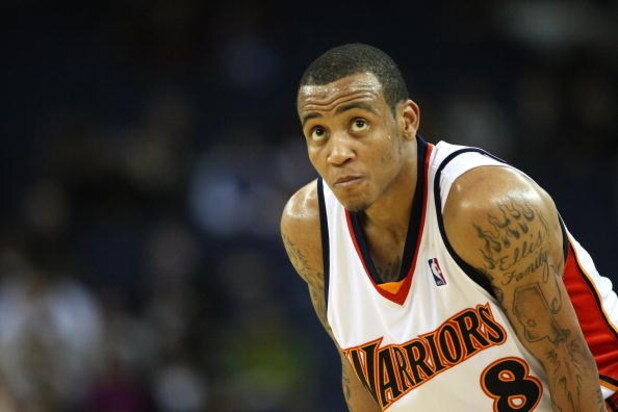 OAKLAND, CA - MARCH 30:  Monta Ellis #8 of the Golden State Warriors looks on against the Memphis Grizzlies during an NBA game on March 30, 2009 at Oracle Arena in Oakland, California. NOTE TO USER: User expressly acknowledges and agrees that, by download