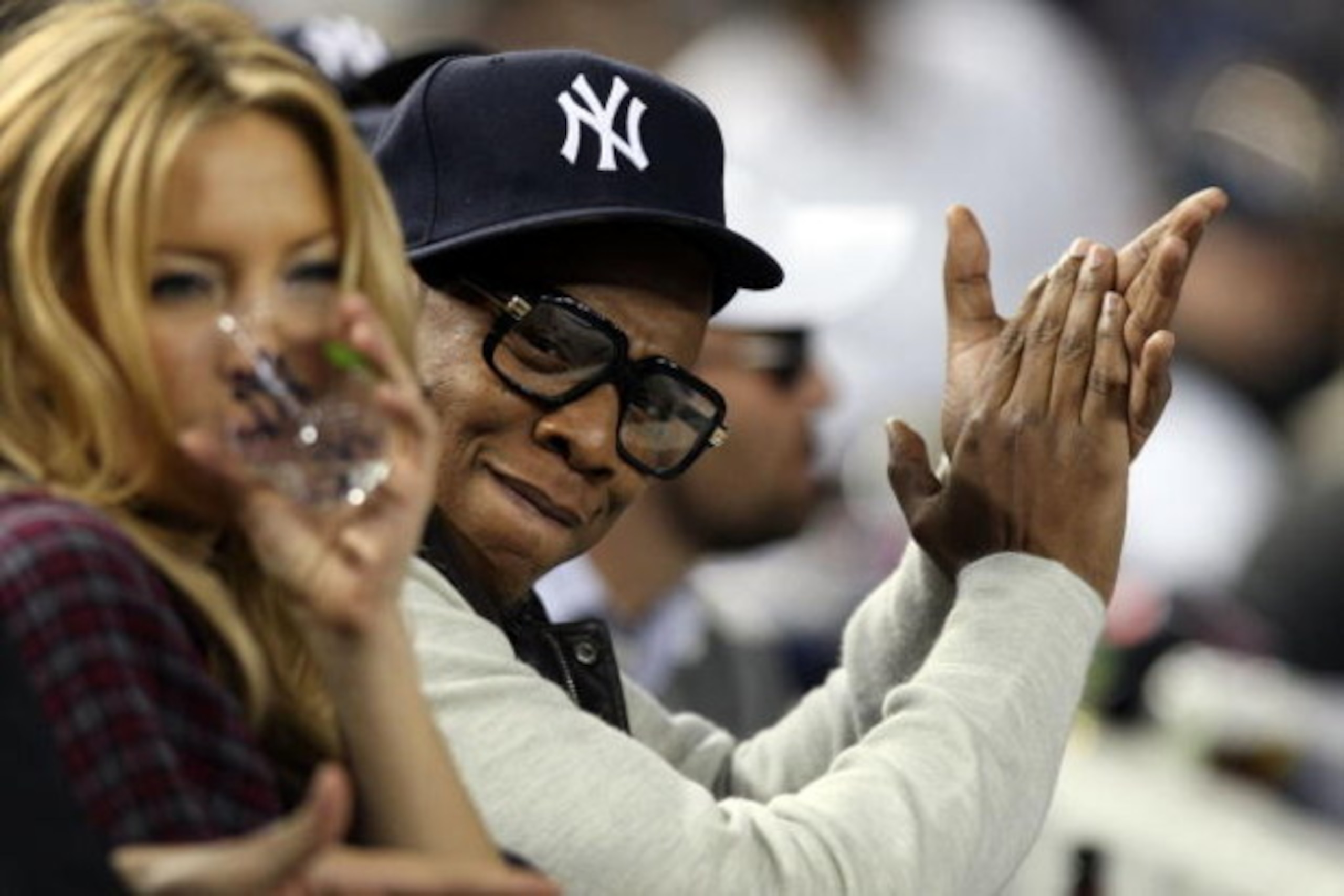 NEW YORK - OCTOBER 07: Actress Kate Hudson and rapper Jay-Z look on from the stands before Game One of the ALDS between the Minnesota Twins and the New York Yankees during the 2009 MLB Playoffs at Yankee Stadium on October 7, 2009 in the Bronx borough of NEW YORK - OCTOBER 07: Actress Kate Hudson and rapper Jay-Z look on from the stands before Game One of the ALDS between the Minnesota Twins and the New York Yankees during the 2009 MLB Playoffs at Yankee Stadium on October 7, 2009 in the Bronx borough of