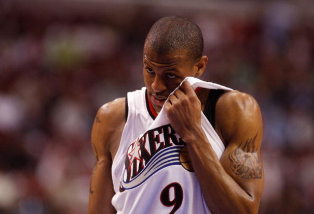 PHILADELPHIA - MAY 01:  Andre Iguodala #9 of the Philadelphia 76ers wipes sweat from his face against the Detroit Pistons in Game Six of the Eastern Conference Quarterfinals during the 2008 NBA Playoffs on May 1, 2008 at the Wachovia Center in Philadelphi