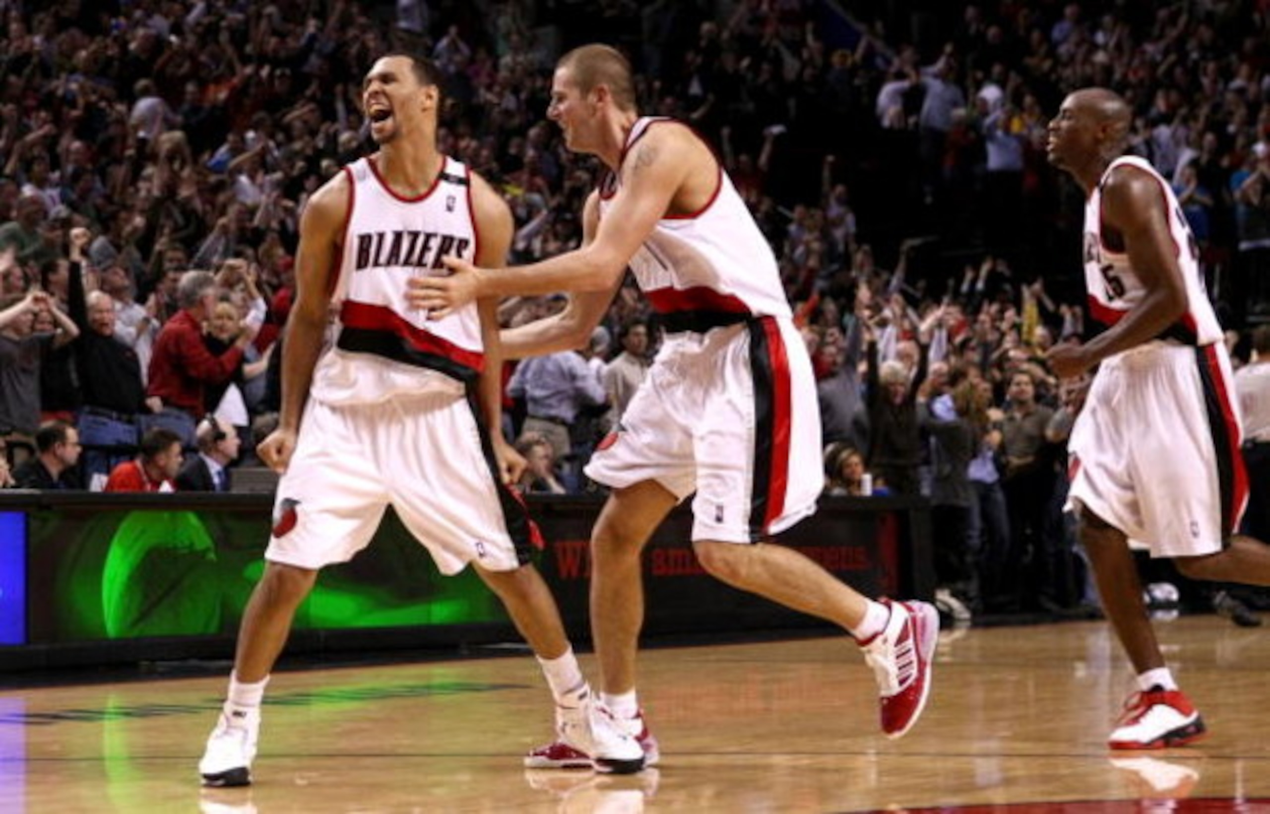 PORTLAND, OR - NOVEMBER 06: Brandon Roy #7 of the Portland Trail Blazers celebrates with Joel Przybilla #10 after making a go ahead shot with 1.9 seconds remaining in overtime agianst the Houston Rockets at the Rose Garden on November 6, 2008 in Portla PORTLAND, OR - NOVEMBER 06: Brandon Roy #7 of the Portland Trail Blazers celebrates with Joel Przybilla #10 after making a go ahead shot with 1.9 seconds remaining in overtime agianst the Houston Rockets at the Rose Garden on November 6, 2008 in Portla