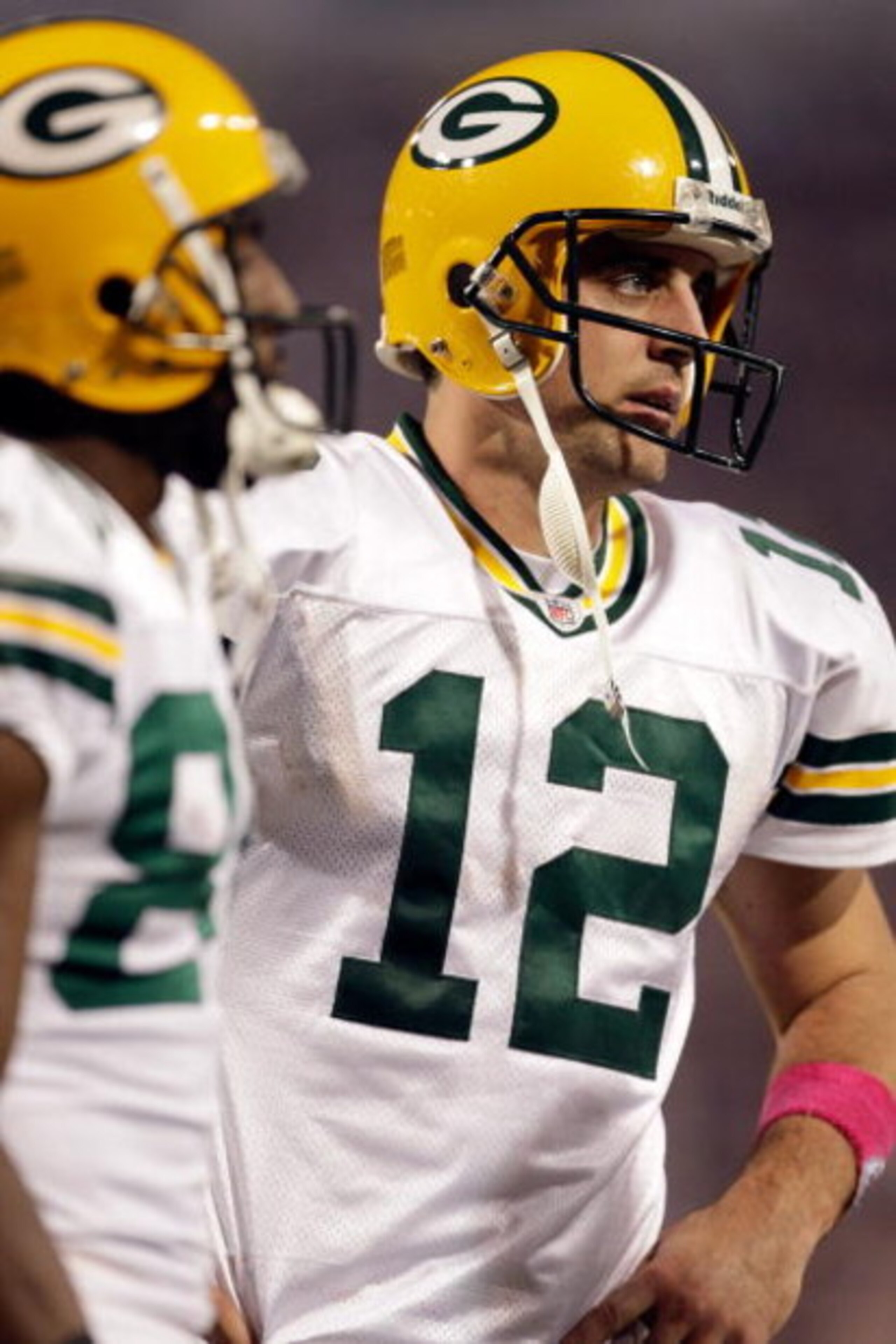 MINNEAPOLIS - OCTOBER 05:  Quarterback Aaron Rodgers #12 of the Green Bay Packers walks off the field during the Monday Night Football game against the Minnesota Vikings on October 5, 2009 at Hubert H. Humphrey Metrodome in Minneapolis, Minnesota.  (Photo