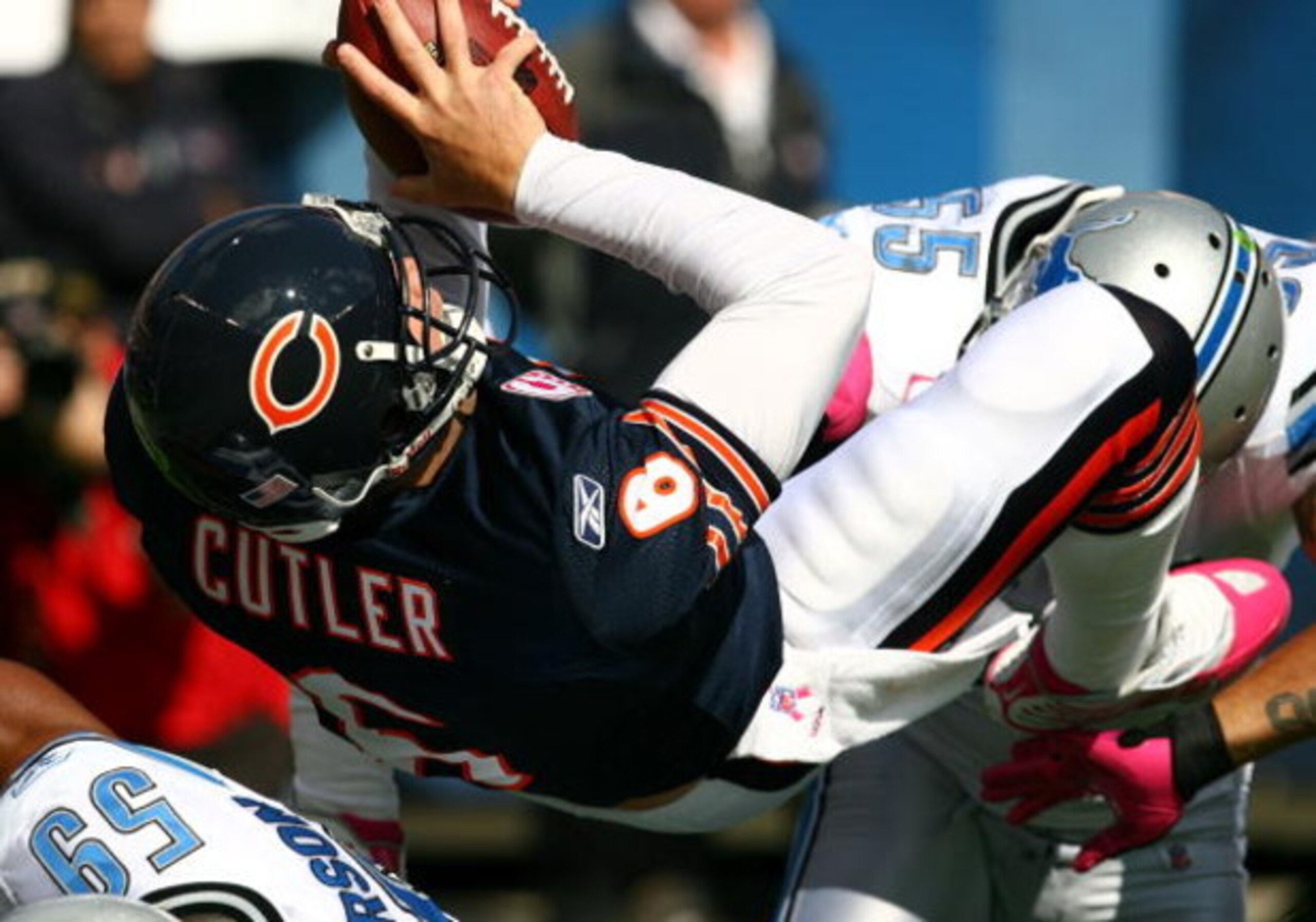 CHICAGO - OCTOBER 04: Jay Cutler #6 of the Chicago Bears flips into the end zone for a touchdown against the Detroit Lions on October 4, 2009 at Soldier Field in Chicago, Illinois. The Bears defeated the Lions 48-24. (Photo by Jonathan Daniel/Getty Images