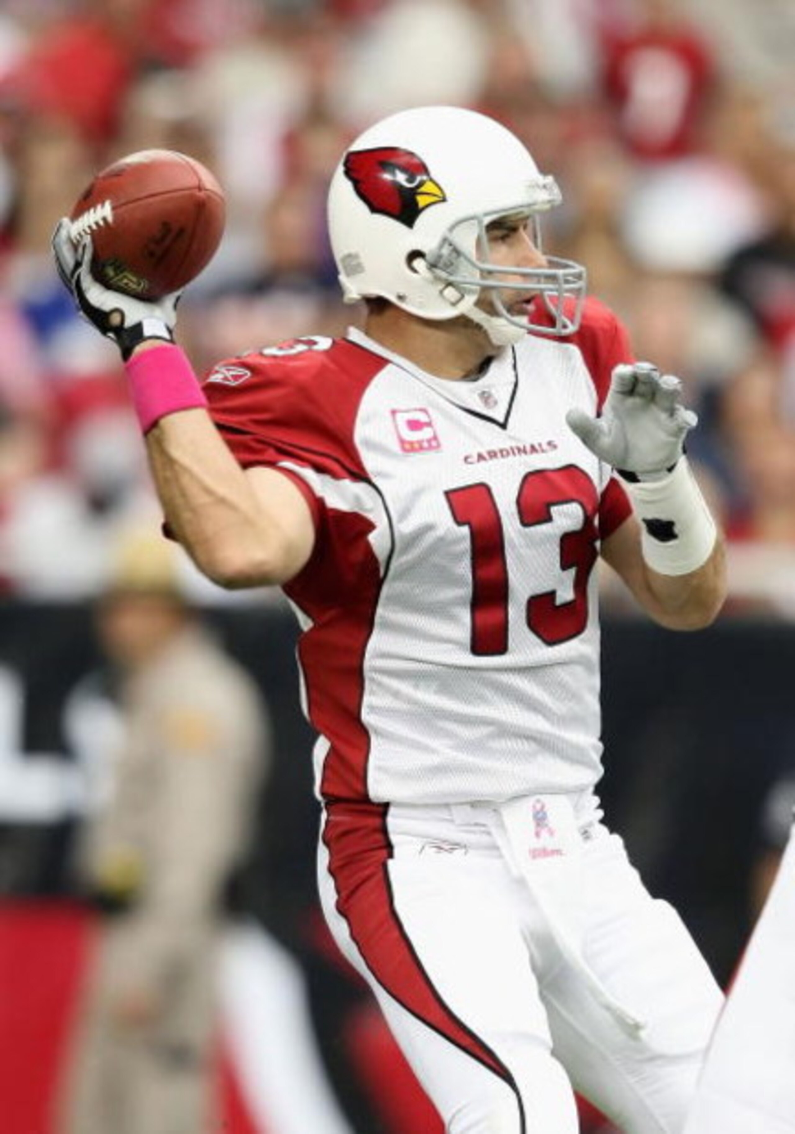 GLENDALE, AZ - OCTOBER 11:  Quarterback Kurt Warner #13 of the Arizona Cardinals drops back to pass during the NFL game against the Houston Texans at the Universtity of Phoenix Stadium on October 11, 2009 in Glendale, Arizona.  The Cardinals defeated the 