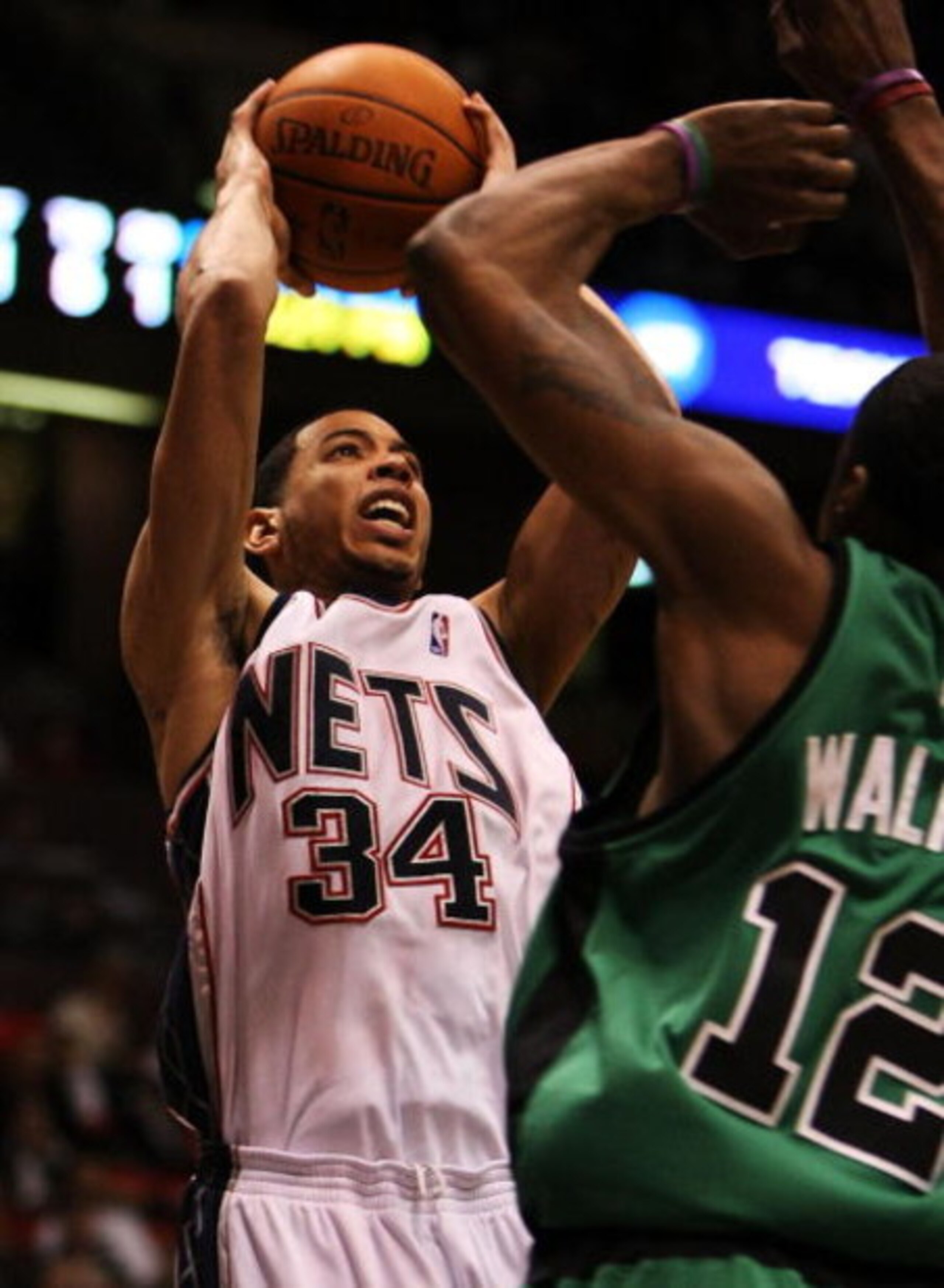 EAST RUTHERFORD, NJ - MARCH 04:  Devin Harris #34 of the New Jersey Nets shoots the ball against The Boston Celtics during their game on March 4th, 2009 at The Izod Center in East Rutherford, New Jersey.  NOTE TO USER: User expressly acknowledges and agre