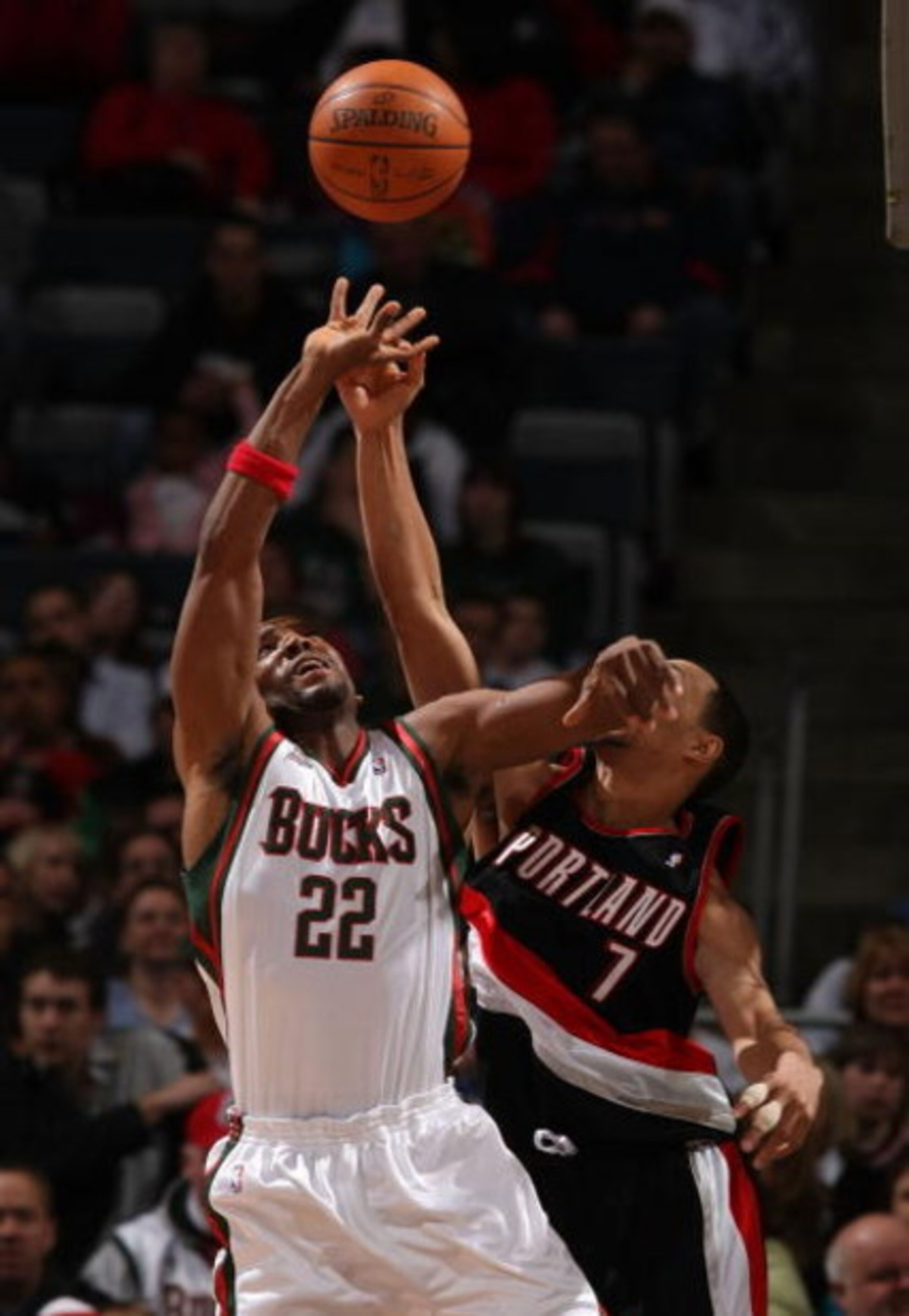 MILWAUKEE - MARCH 07:  Michael Redd #22 of the Milwaukee Bucks battles for a rebound with Brandon Roy #7 of the Portland Trail Blazers at the Bradley Center March 7, 2008 in Milwaukee, Wisconsin. NOTE TO USER: User expressly acknowledges and agrees that, 