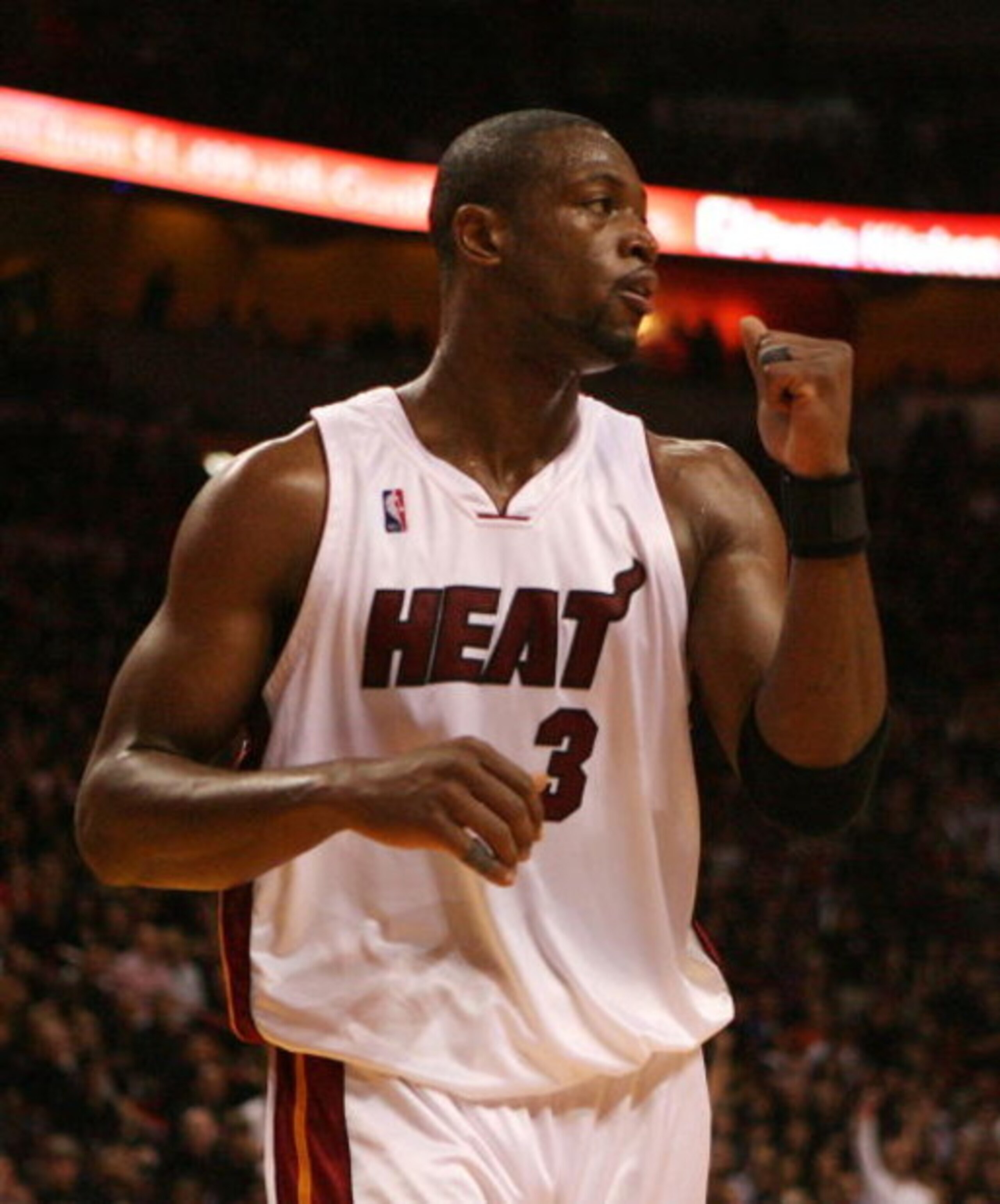 MIAMI - MAY 01:  Dwyane Wade #3 of the Miami Heat pumps his fist after the heat get a stop in the fourth quarter against the Atlanta Hawks during Game Six of the Eastern Conference Quarterfinals at American Airlines Arena on May 1, 2009 in Miami, Florida.
