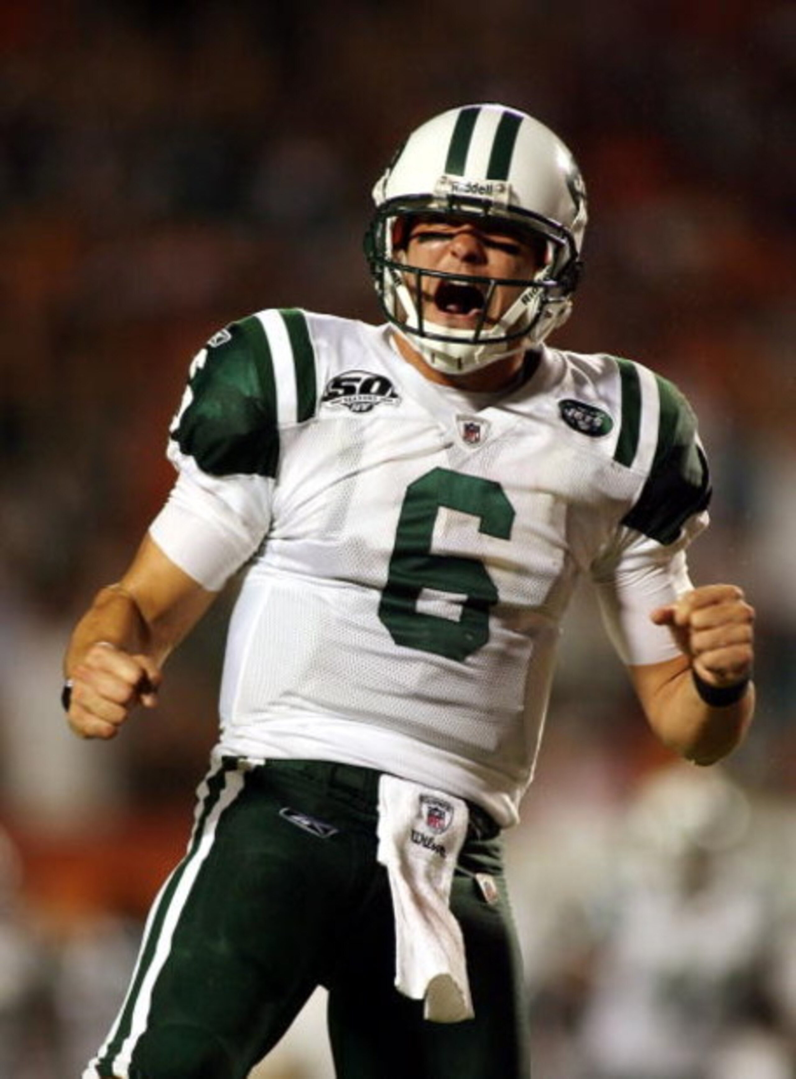 MIAMI - OCTOBER 12: Quarterback Mark Sanchez #6 of the New York Jets celebrate a touchdown against the Miami Dolphins at Land Shark Stadium on October 12, 2009 in Miami, Florida. (Photo by Marc Serota/Getty Images) MIAMI - OCTOBER 12: Quarterback Mark Sanchez #6 of the New York Jets celebrate a touchdown against the Miami Dolphins at Land Shark Stadium on October 12, 2009 in Miami, Florida. (Photo by Marc Serota/Getty Images)