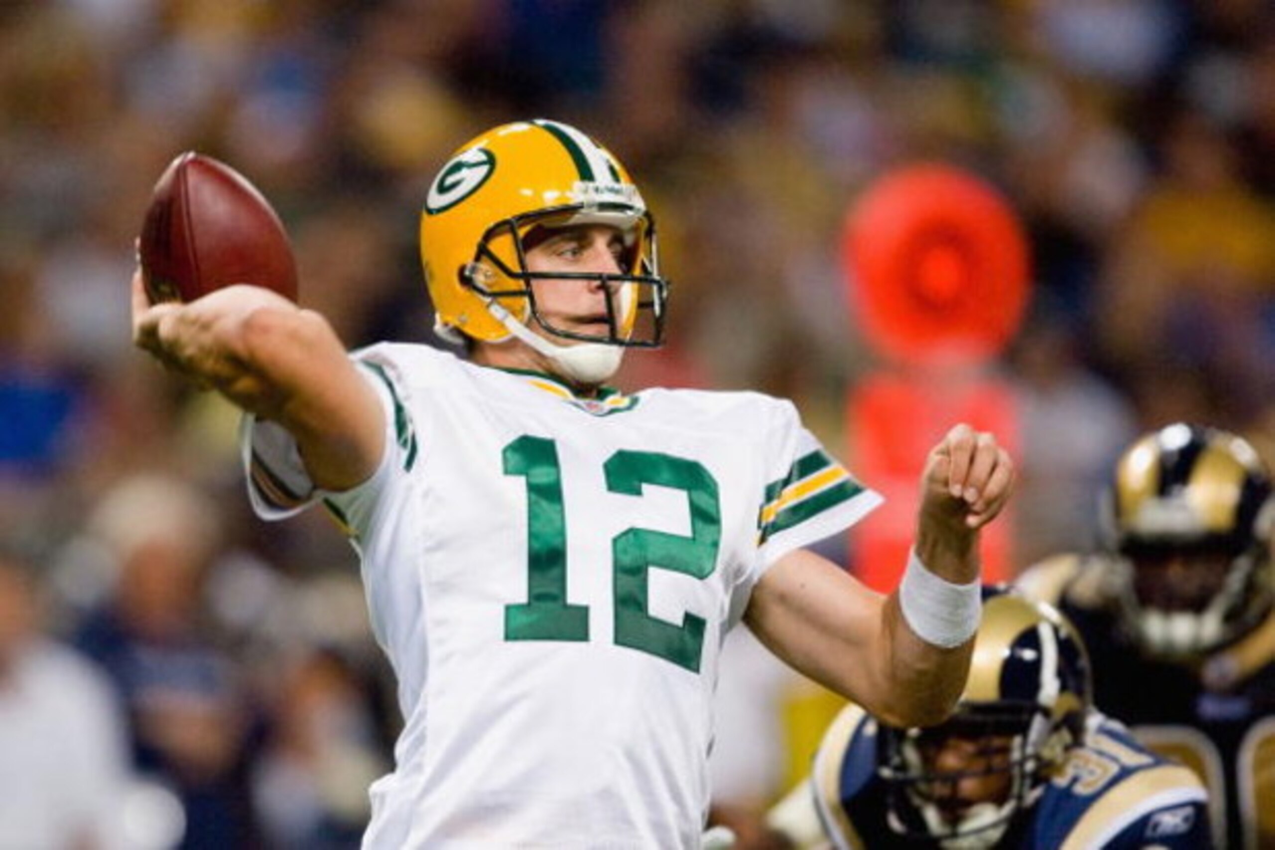 ST. LOUIS, MO - SEPTEMBER 27: Aaron Rodgers #12 of the Green Bay Packers passes during the game against the St. Louis Rams at the Edward Jones Dome on September 27, 2009 in St. Louis, Missouri. (Photo by Dilip Vishwanat/Getty Images) ST. LOUIS, MO - SEPTEMBER 27: Aaron Rodgers #12 of the Green Bay Packers passes during the game against the St. Louis Rams at the Edward Jones Dome on September 27, 2009 in St. Louis, Missouri. (Photo by Dilip Vishwanat/Getty Images)