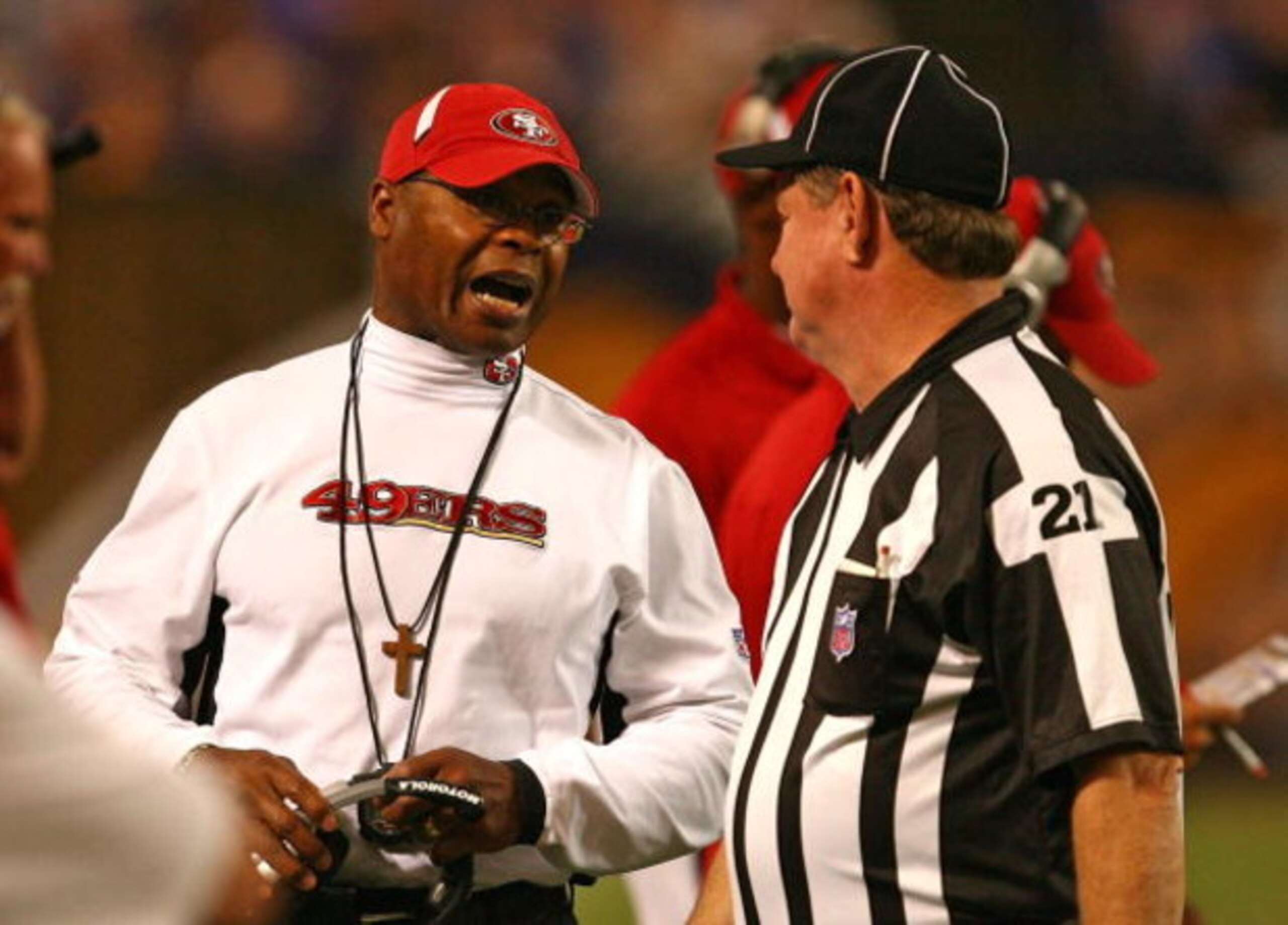 MINNEAPOLIS - SEPTEMBER 27: Head coach Mike Singletary of the San Francisco 49ers argues with Head Linesman John Schleyer #21 during a game against the Minnesota Vikings at the Hubert H. Humphrey Metrodome on September 27, 2009 in Minneapolis, Minnesota. MINNEAPOLIS - SEPTEMBER 27: Head coach Mike Singletary of the San Francisco 49ers argues with Head Linesman John Schleyer #21 during a game against the Minnesota Vikings at the Hubert H. Humphrey Metrodome on September 27, 2009 in Minneapolis, Minnesota.