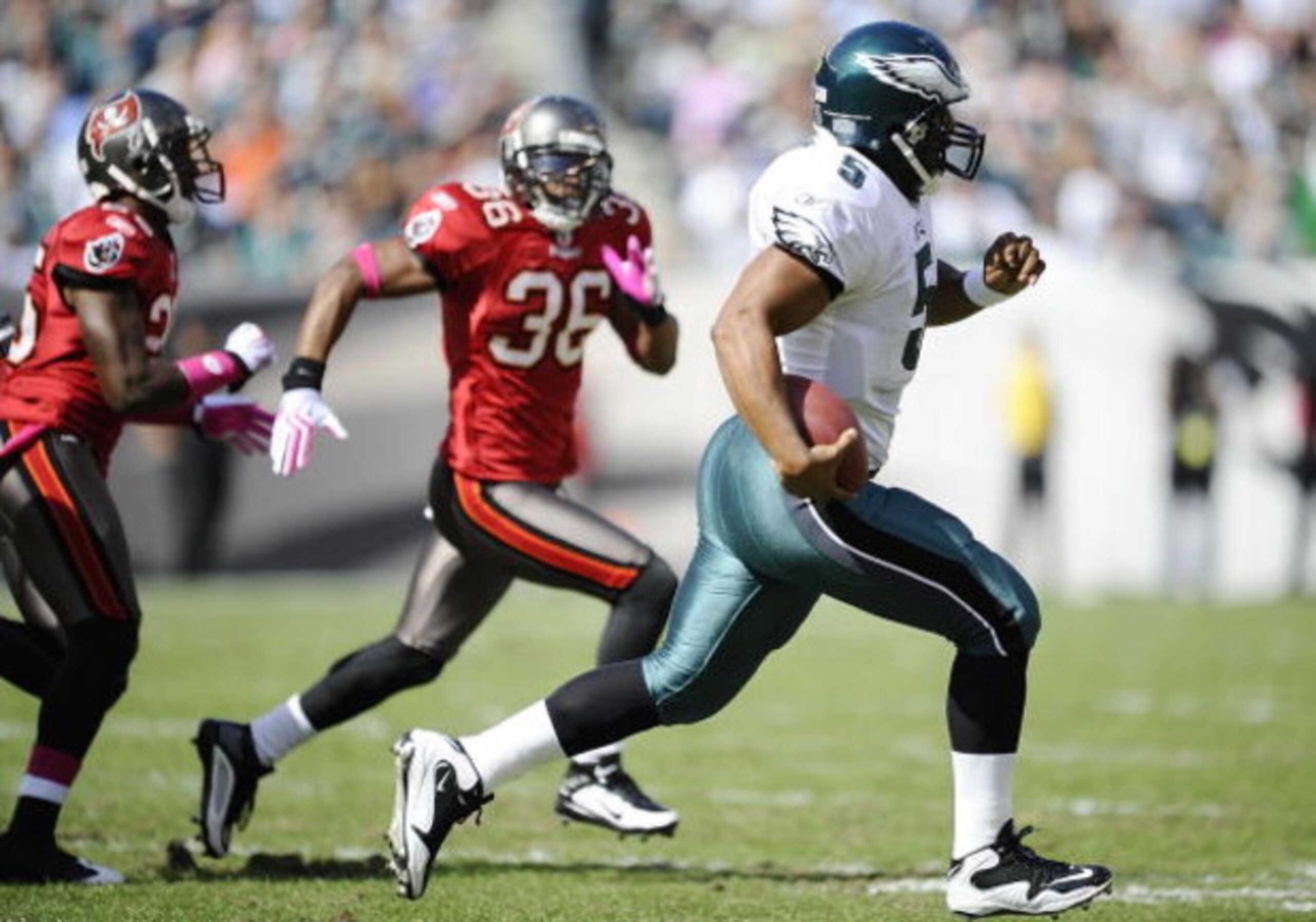 PHILADELPHIA - OCTOBER 11: Donovan McNabb #5 of the Philadelphia Eagles runs the ball away from Tanard Jackson #36 and Aqib Talib #25 of the Tampa Bay Buccaneers at Lincoln Financial Field on October 11, 2009 in Philadelphia, Pennsylvania. (Photo by Jef PHILADELPHIA - OCTOBER 11: Donovan McNabb #5 of the Philadelphia Eagles runs the ball away from Tanard Jackson #36 and Aqib Talib #25 of the Tampa Bay Buccaneers at Lincoln Financial Field on October 11, 2009 in Philadelphia, Pennsylvania. (Photo by Jef