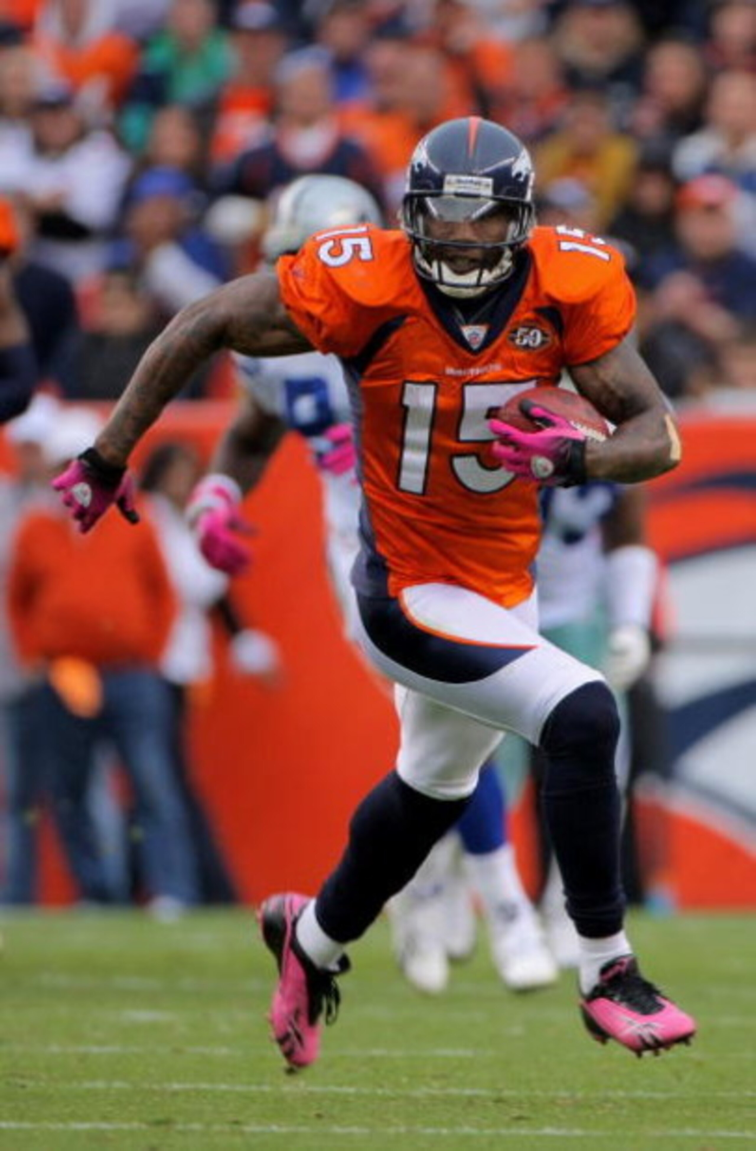 DENVER - OCTOBER 04: Brandon Marshall #15 of the Denver Broncos makes a reception against the Dallas Cowboys during NFL action at Invesco Field at Mile High on October 4, 2009 in Denver, Colorado. The Broncos defeated the Cowboys 17-10. (Photo by Doug P DENVER - OCTOBER 04: Brandon Marshall #15 of the Denver Broncos makes a reception against the Dallas Cowboys during NFL action at Invesco Field at Mile High on October 4, 2009 in Denver, Colorado. The Broncos defeated the Cowboys 17-10. (Photo by Doug P