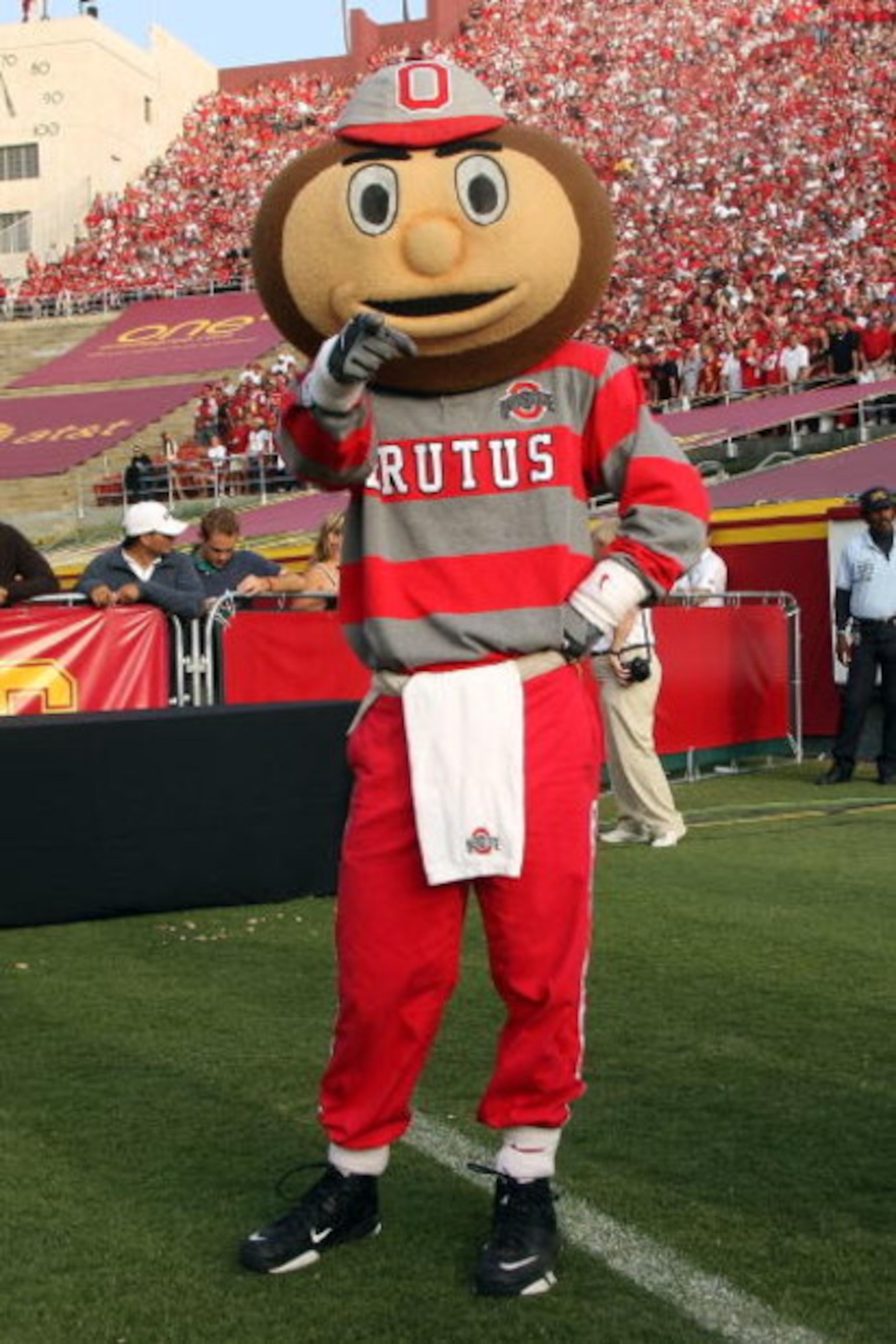 LOS ANGELES, CA - SEPTEMBER 13: Ohio State mascot Brutus Buckeye poses for a photo prior to the Buckeyes 35-3 loss to the USC Trojans at the Los Angeles Memorial Coliseum on September 13, 2008 in Los Angeles, California. (Photo by Stephen Dunn/Getty Ima LOS ANGELES, CA - SEPTEMBER 13: Ohio State mascot Brutus Buckeye poses for a photo prior to the Buckeyes 35-3 loss to the USC Trojans at the Los Angeles Memorial Coliseum on September 13, 2008 in Los Angeles, California. (Photo by Stephen Dunn/Getty Ima