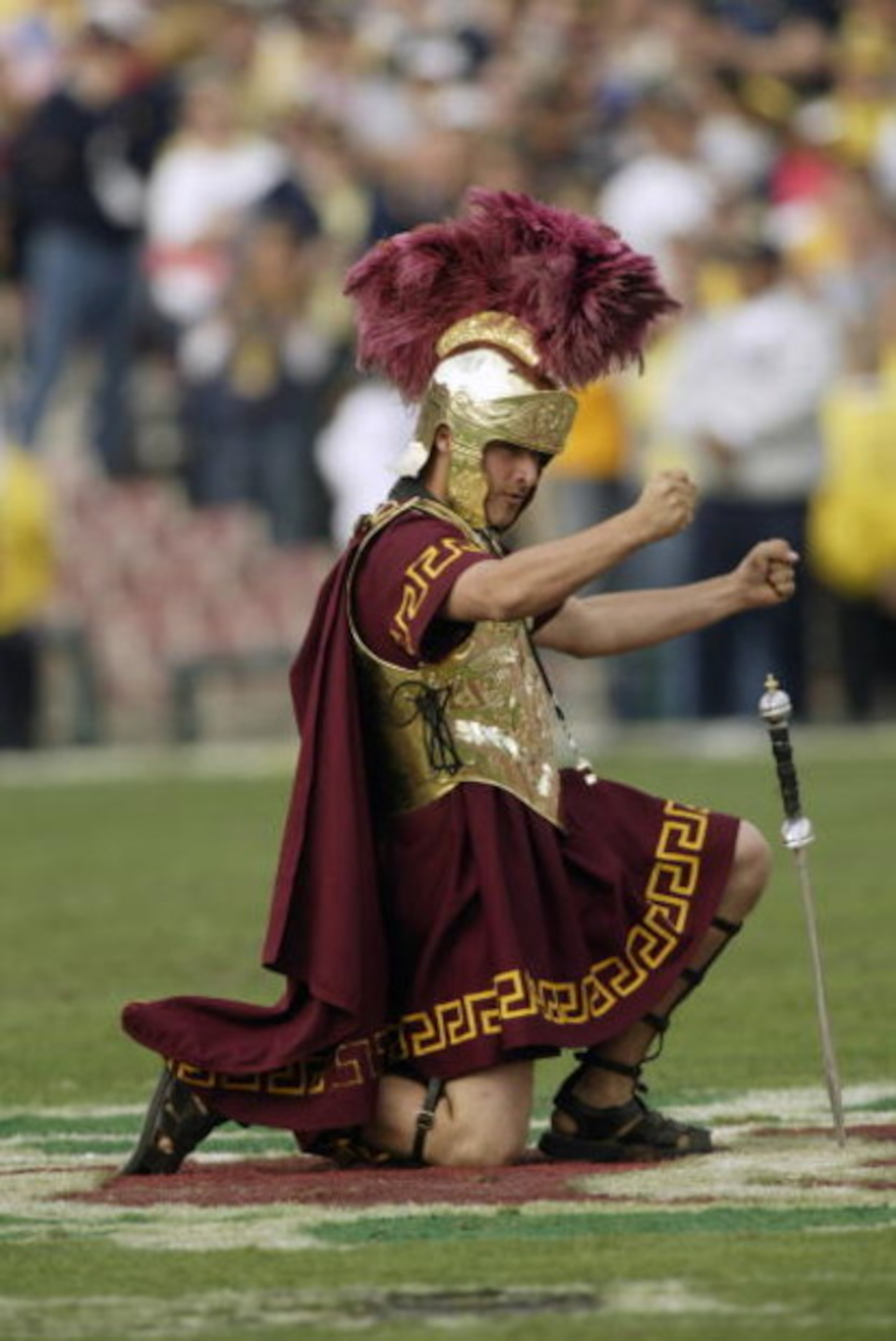 PASADENA, CA - JANUARY 1:  Tommy Trojan, mascot of the USC Trojans entertains the crowd during an intermission in the 2004 Rose Bowl game against the Michigan Wolverines on January 1, 2004 at the Rose Bowl in Pasadena, California. USC defeated Michigan 28