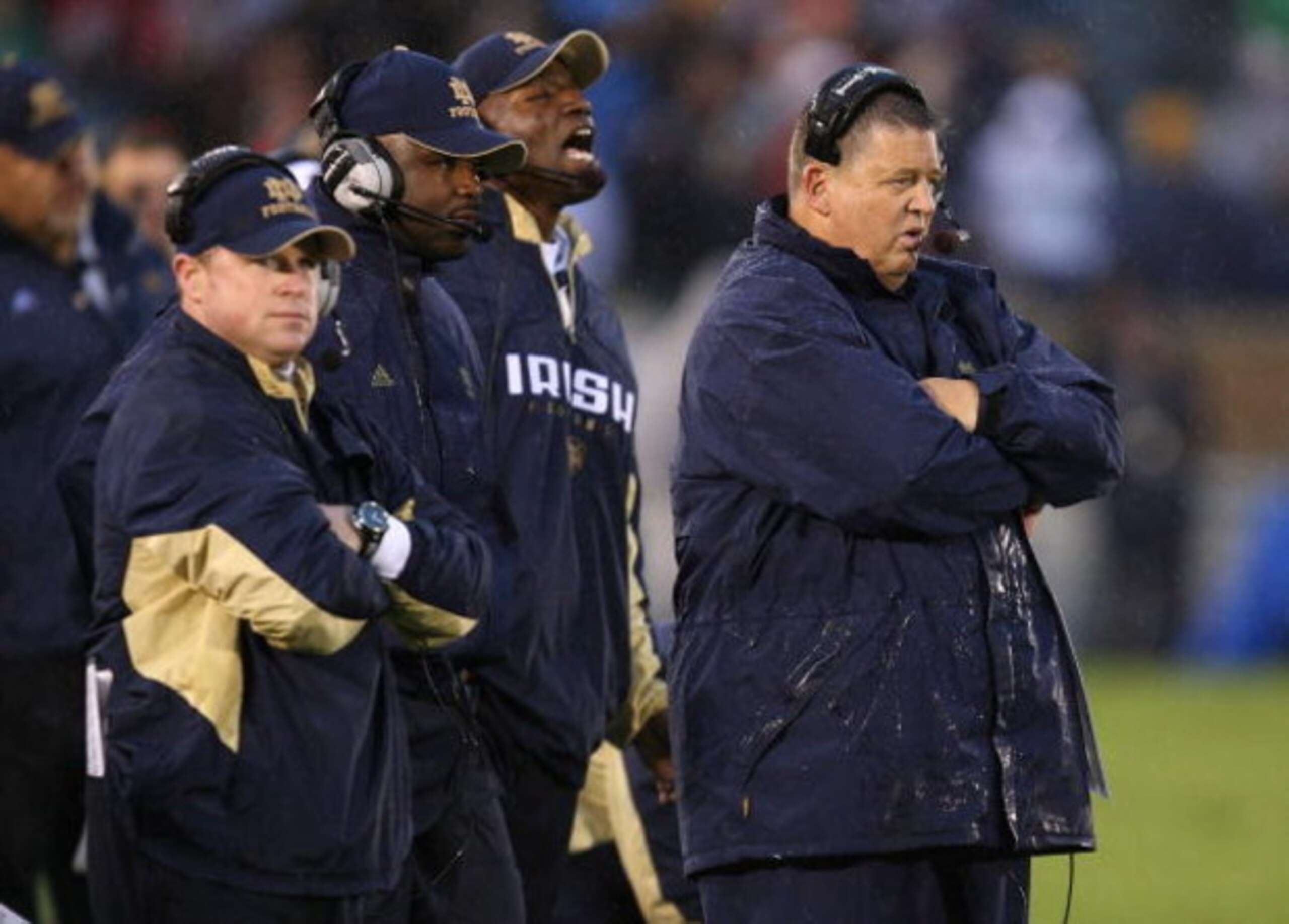 SOUTH BEND, IN - OCTOBER 03: Head coach Charlie Weis of the Notre Dame Fighting Irish and his staff watch as their team takes on the Washington Huskies on October 3, 2009 at Notre Dame Stadium in South Bend, Indiana. Notre Dame defeated Washington 37-30 i SOUTH BEND, IN - OCTOBER 03: Head coach Charlie Weis of the Notre Dame Fighting Irish and his staff watch as their team takes on the Washington Huskies on October 3, 2009 at Notre Dame Stadium in South Bend, Indiana. Notre Dame defeated Washington 37-30 i